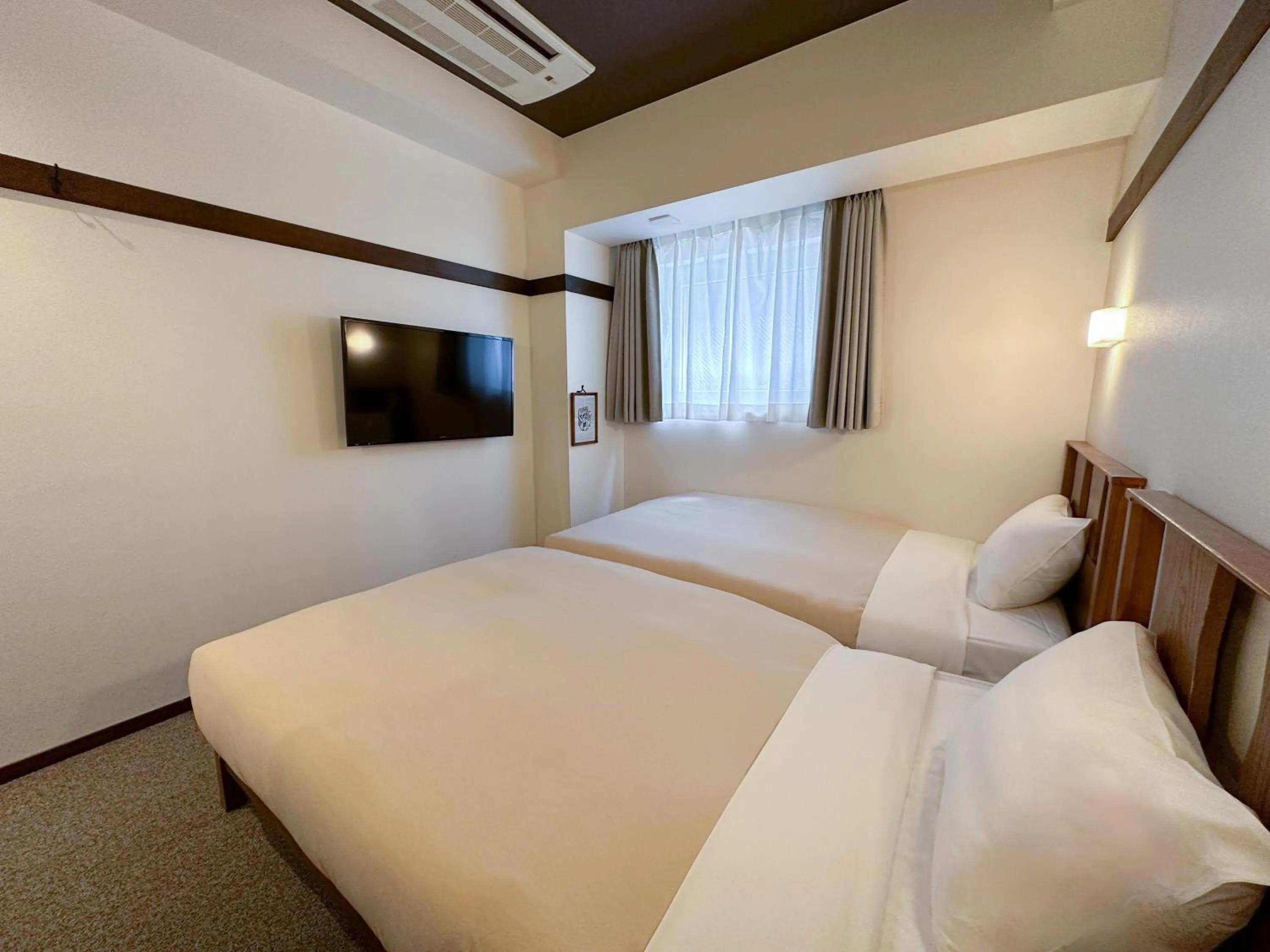 Photo of the whole room, Bed in The OneFive Tokyo Shibuya