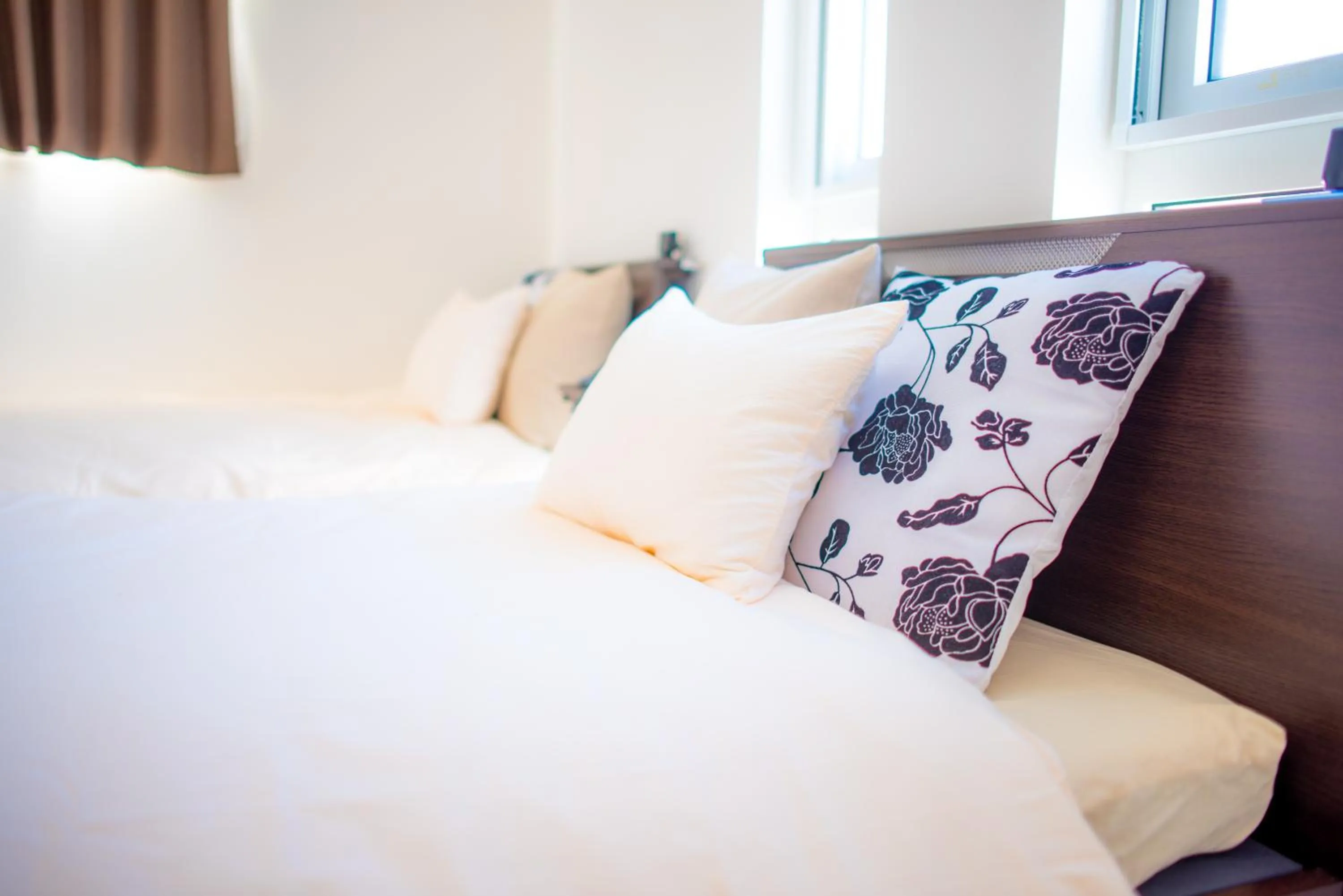 Bed in Kourijima L'hotels