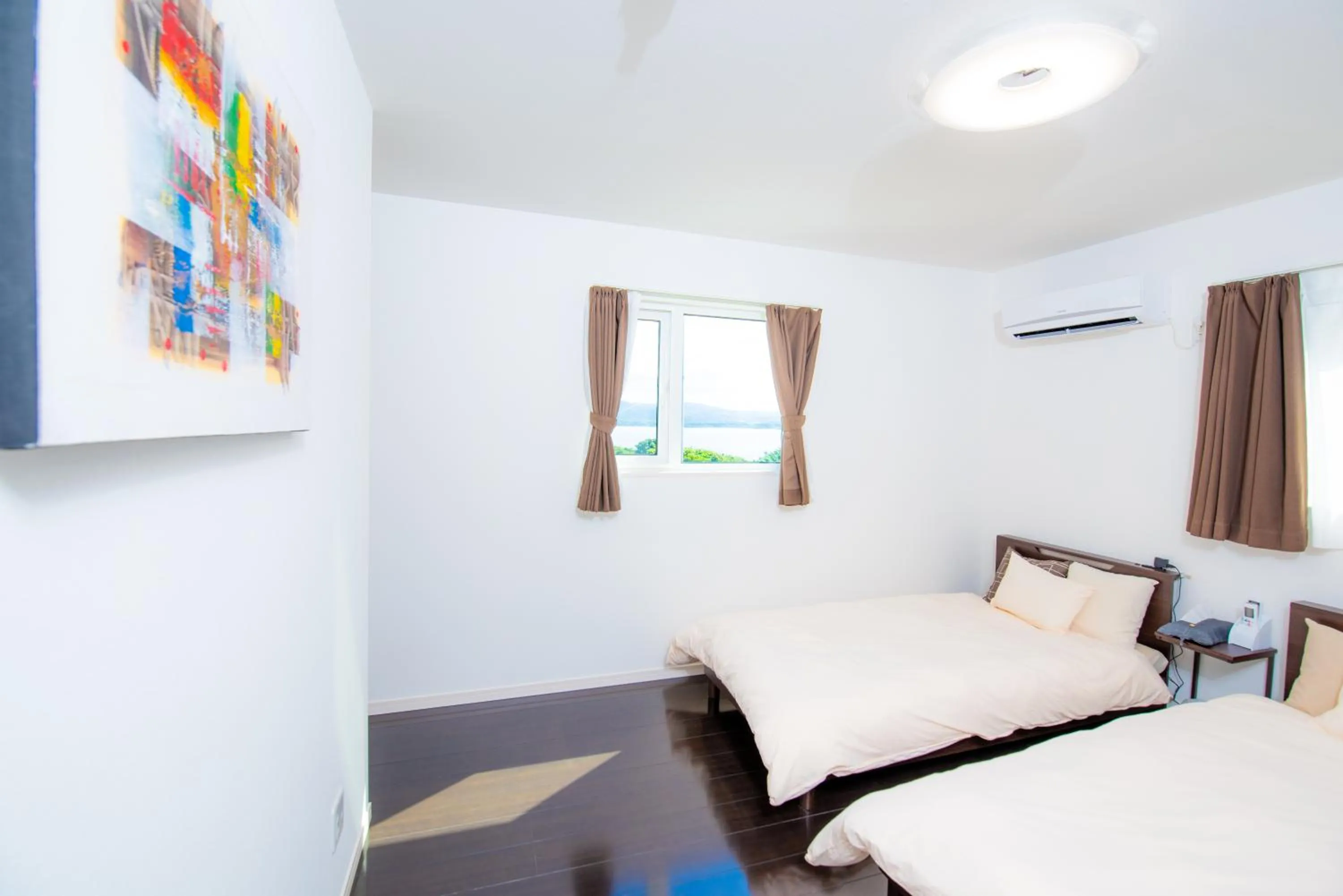 Bed in Kourijima L'hotels