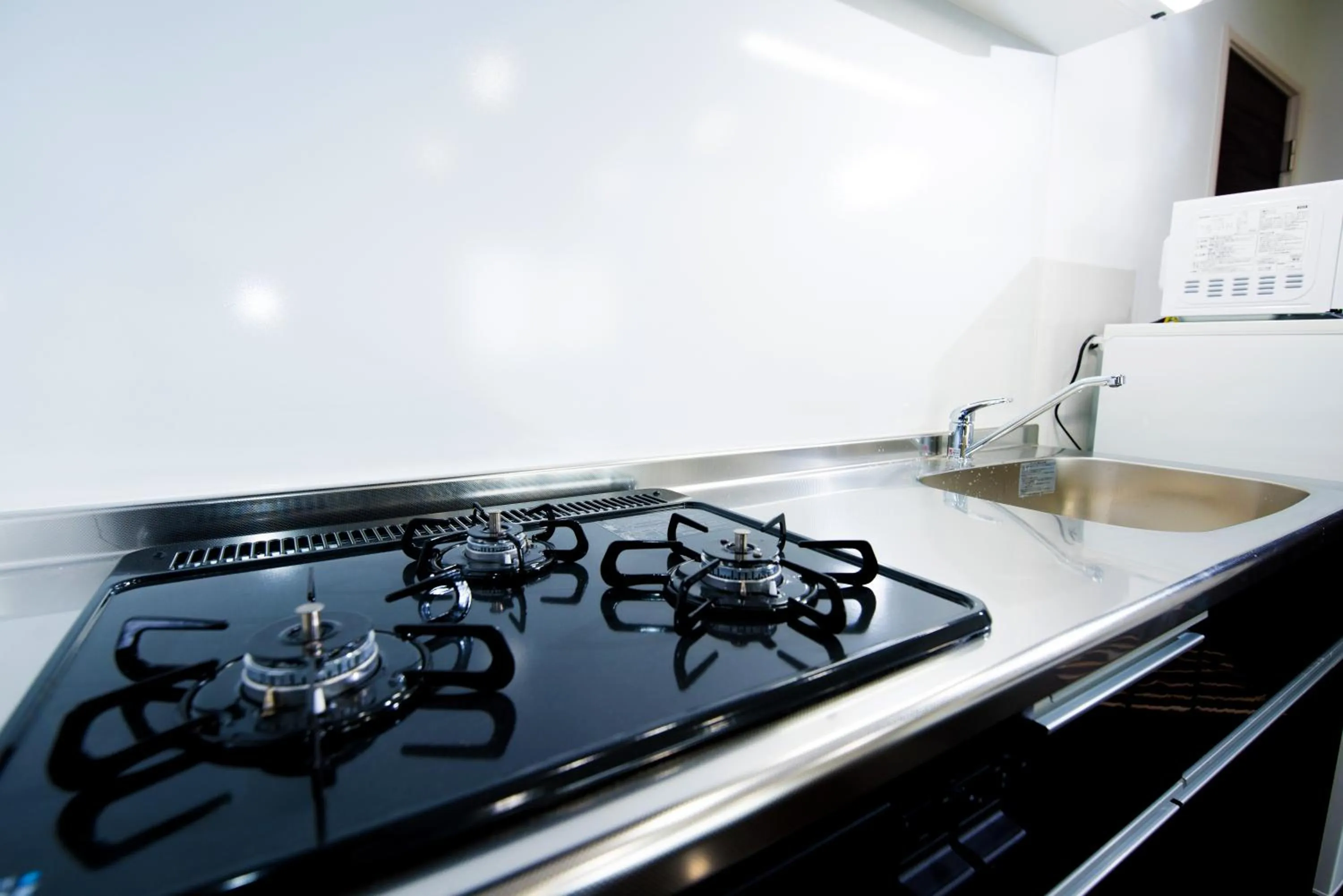 Kitchen or kitchenette in Kourijima L'hotels