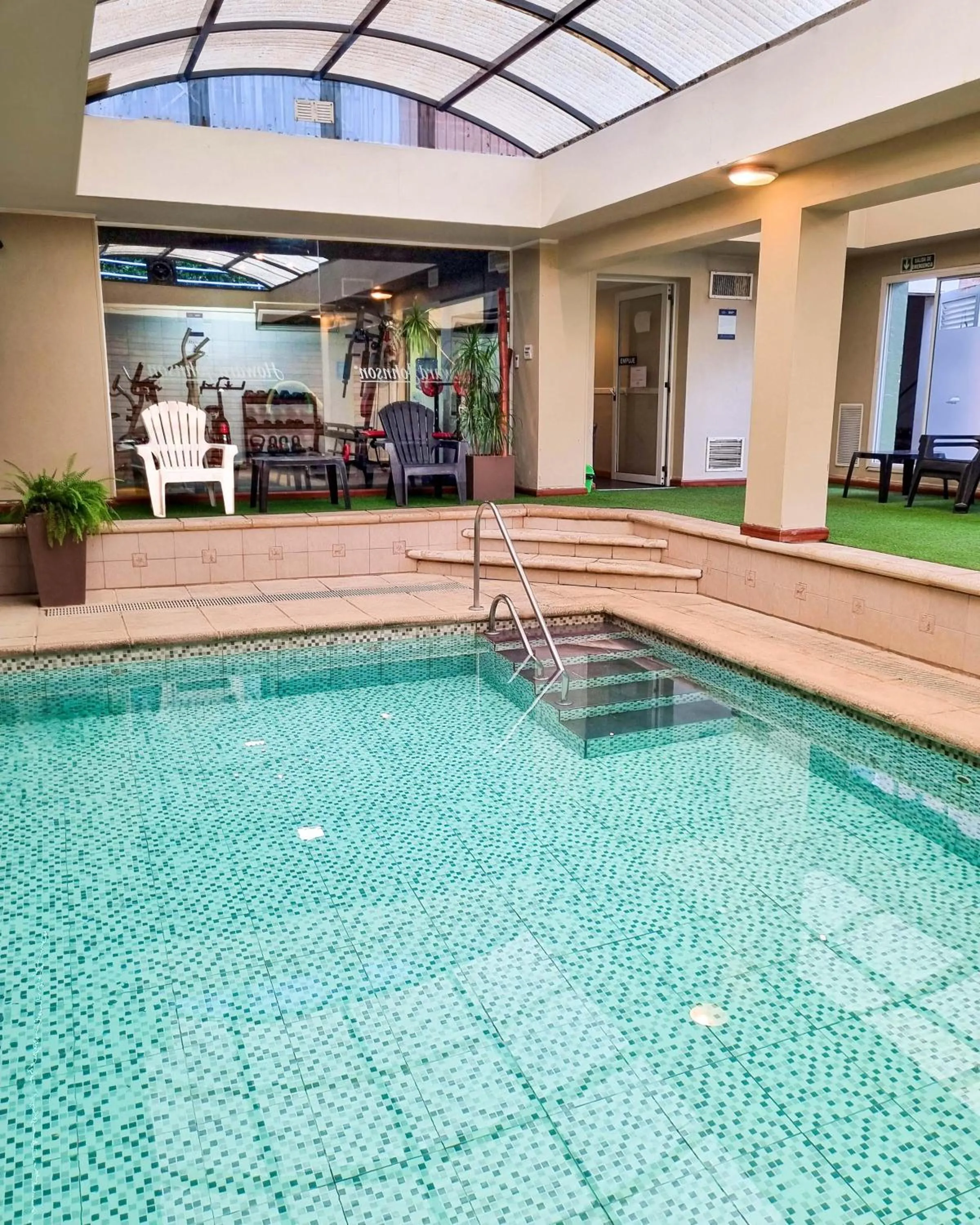 Swimming pool in Howard Johnson Hotel & Spa Villa General Belgrano