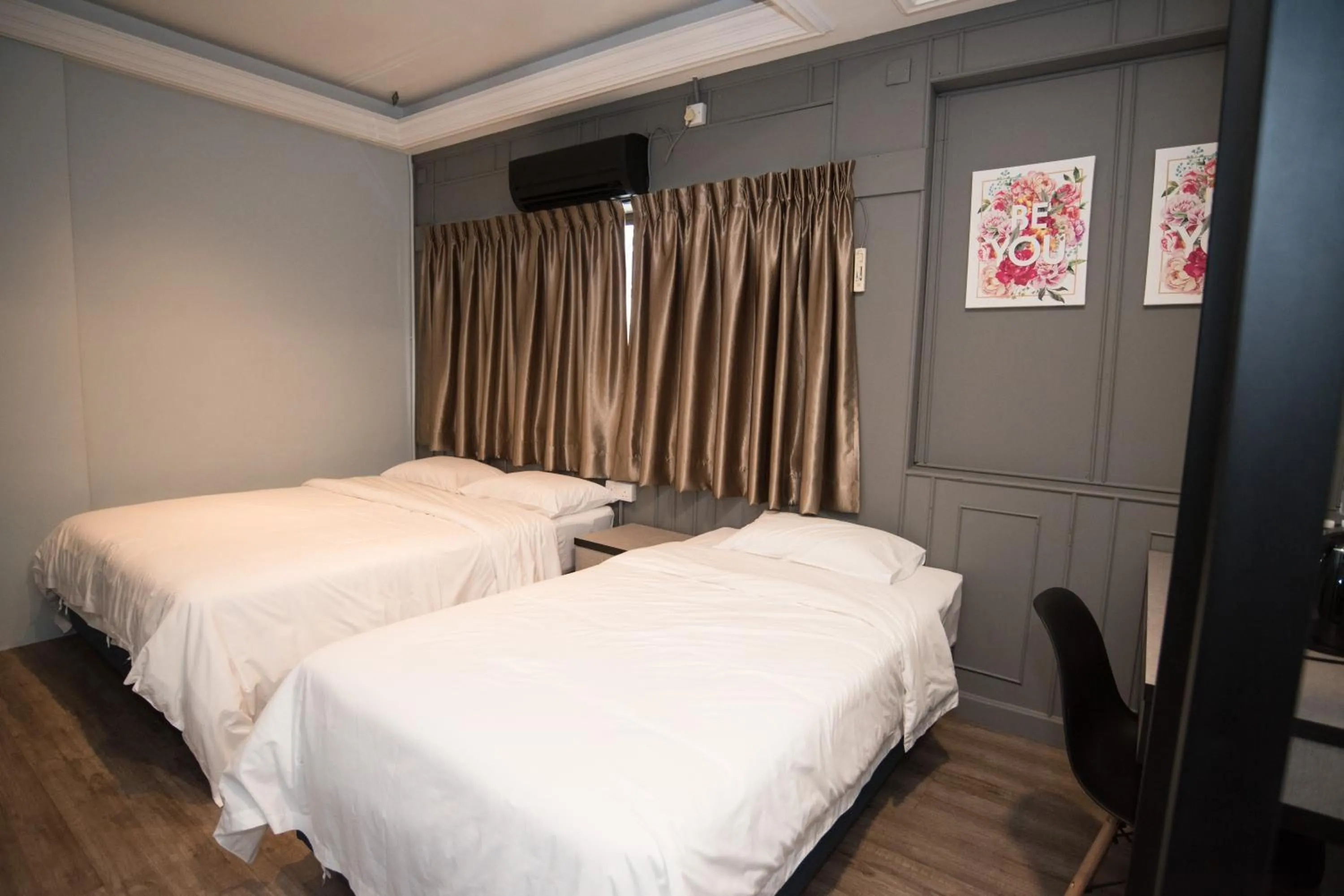 Bed in Ipoh Sakura Hotel