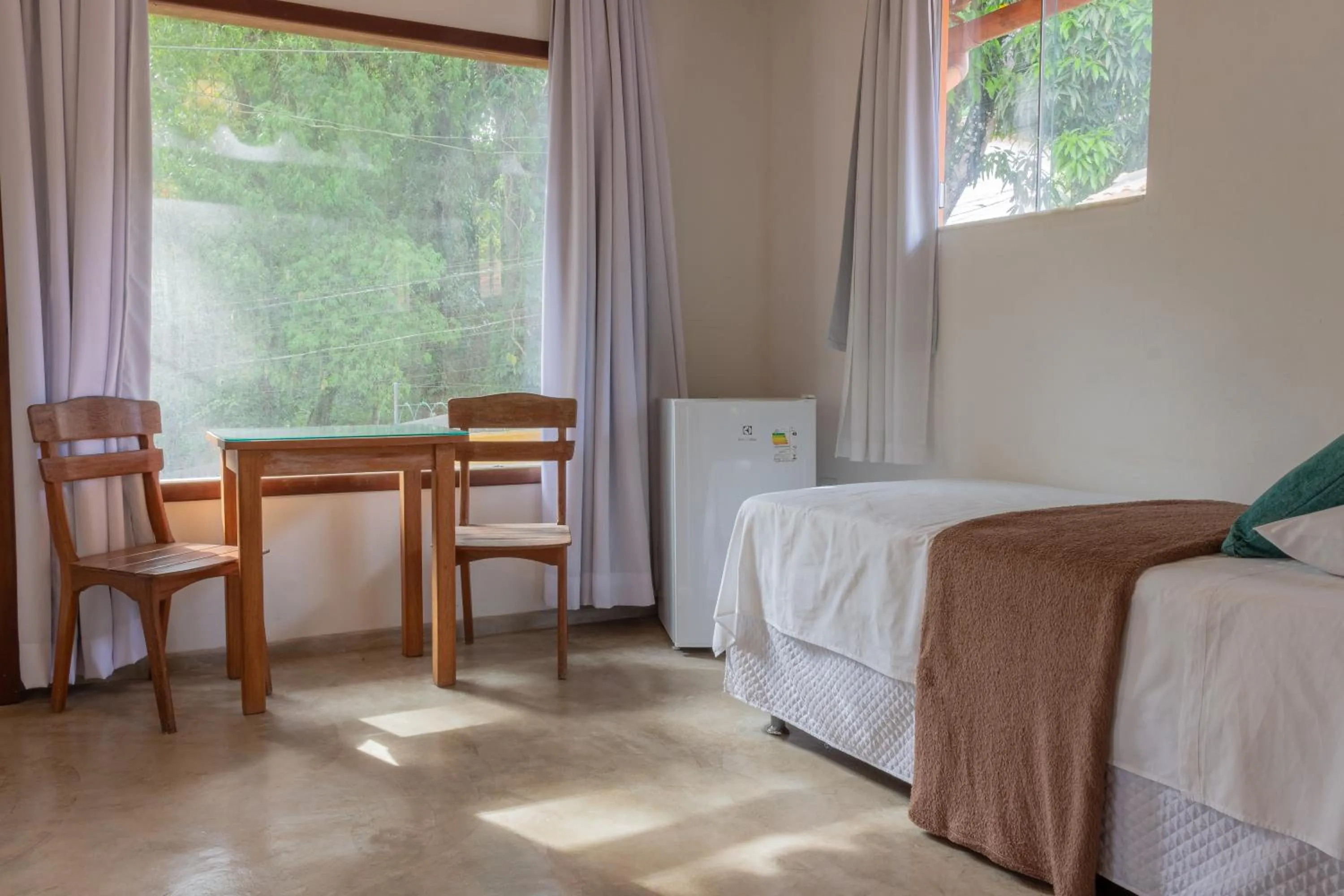 Bed in Pariri Suites