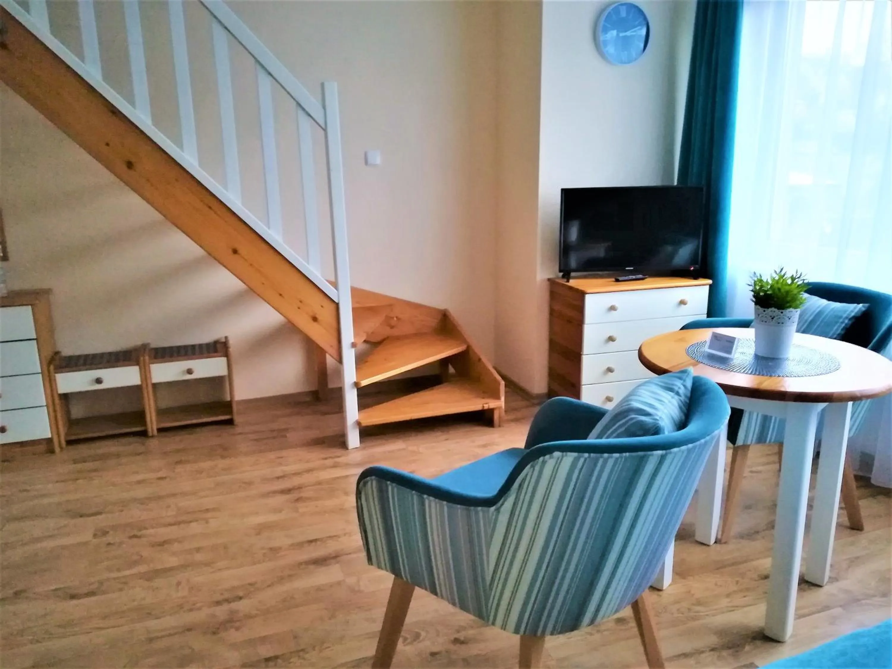 Communal lounge/ TV room in Villa Magna