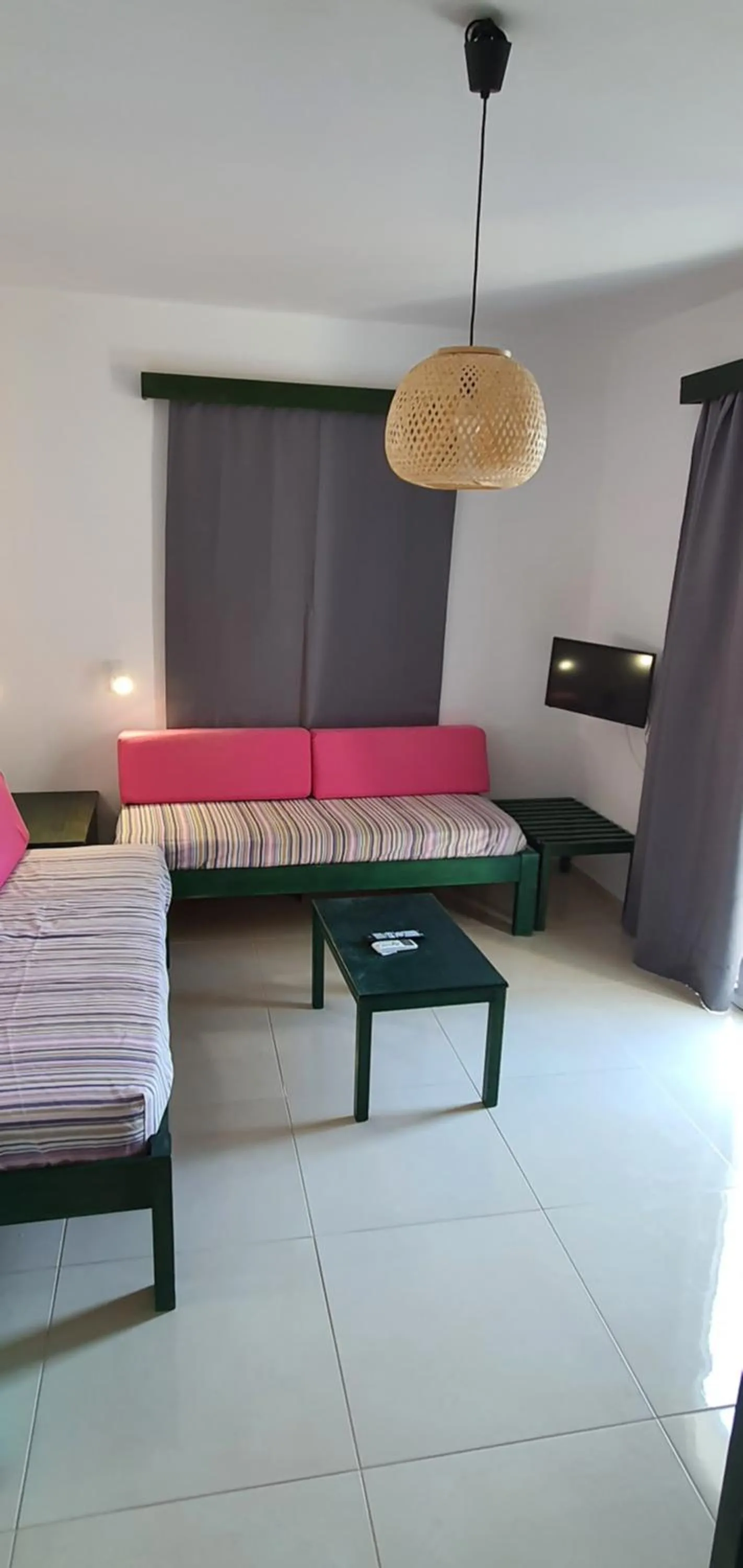 Communal lounge/ TV room, Bed in Stella Apartments