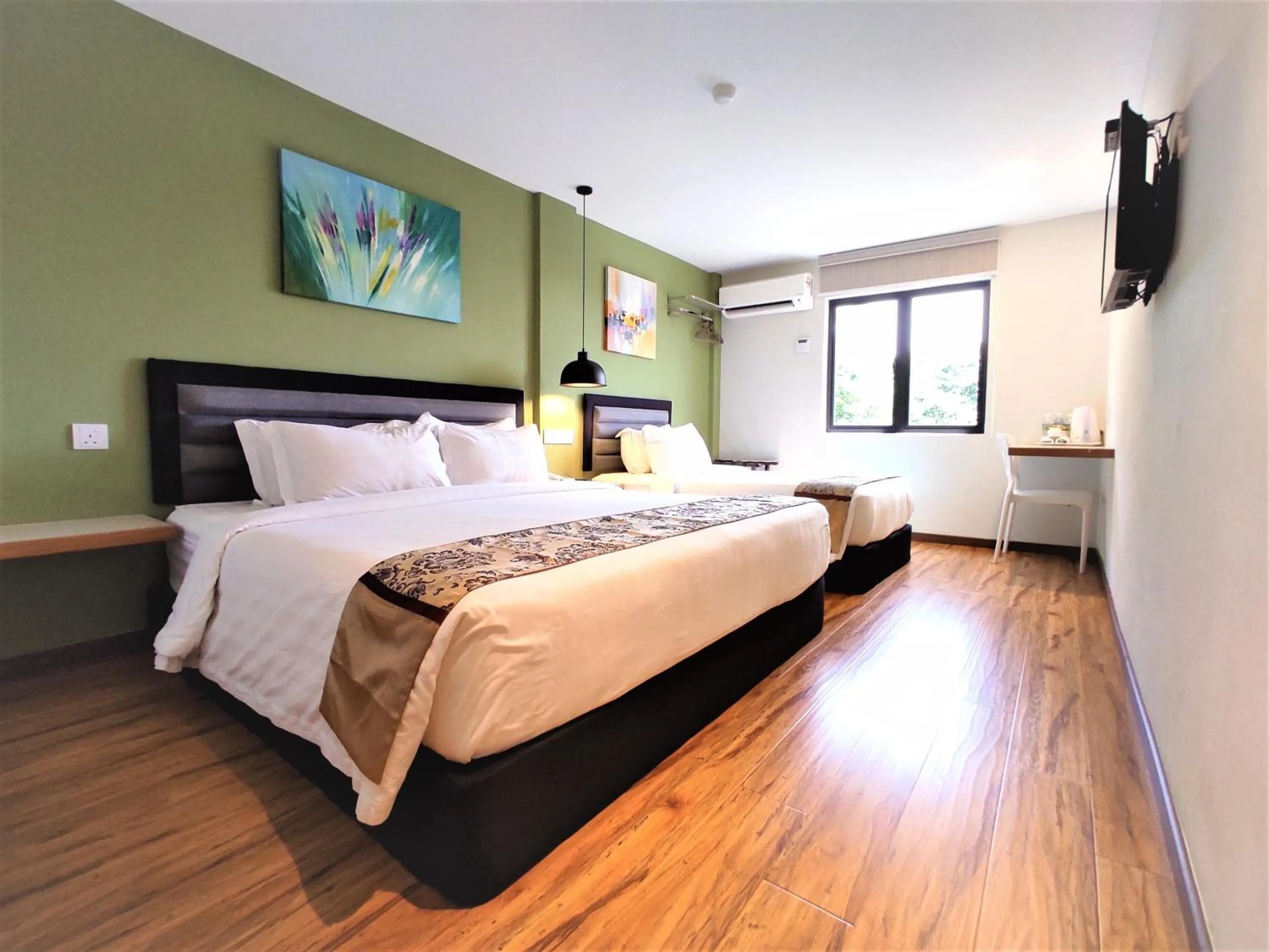 Photo of the whole room, Bed in Apple Suites Hotel