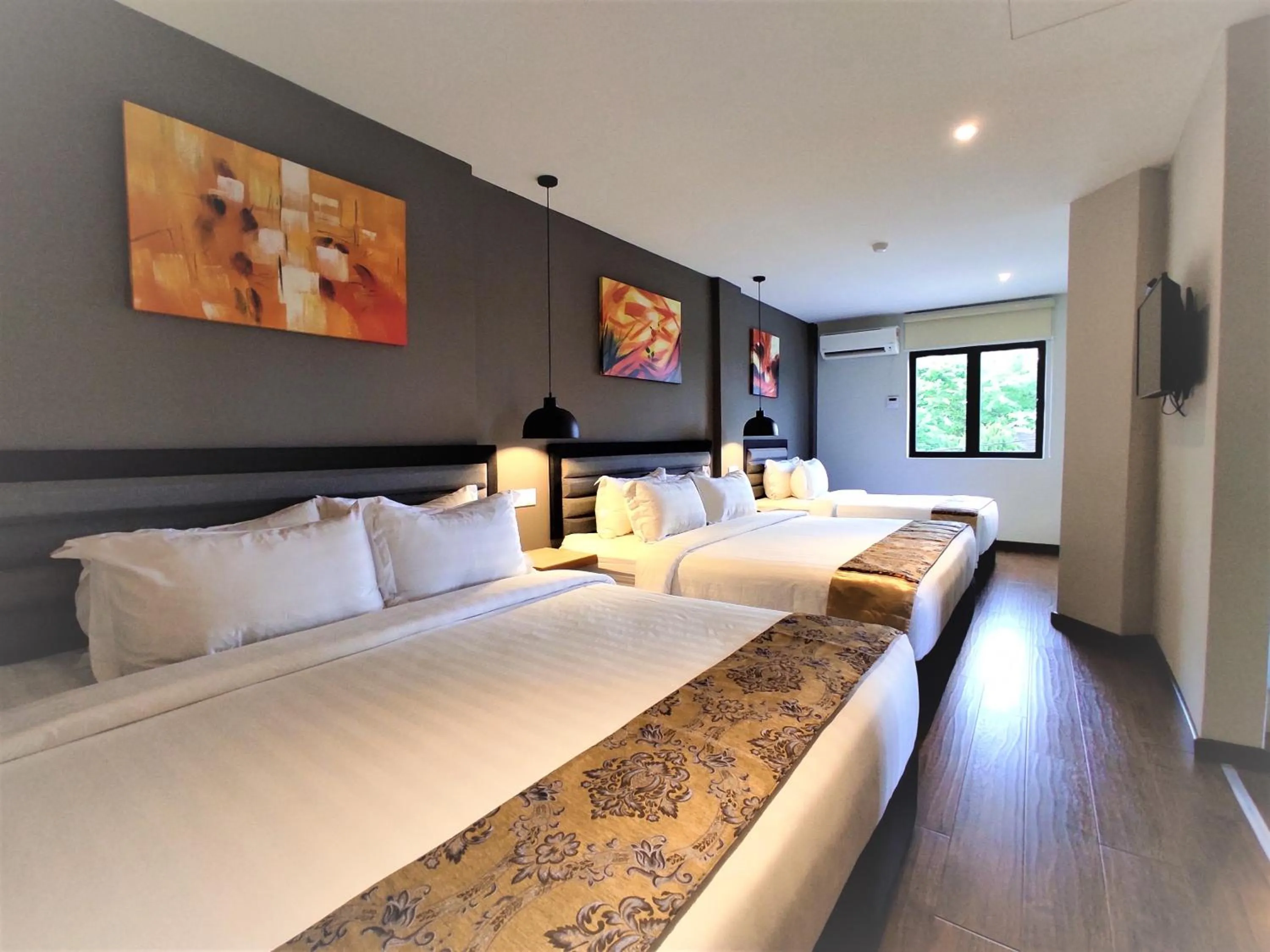 Photo of the whole room, Bed in Apple Suites Hotel