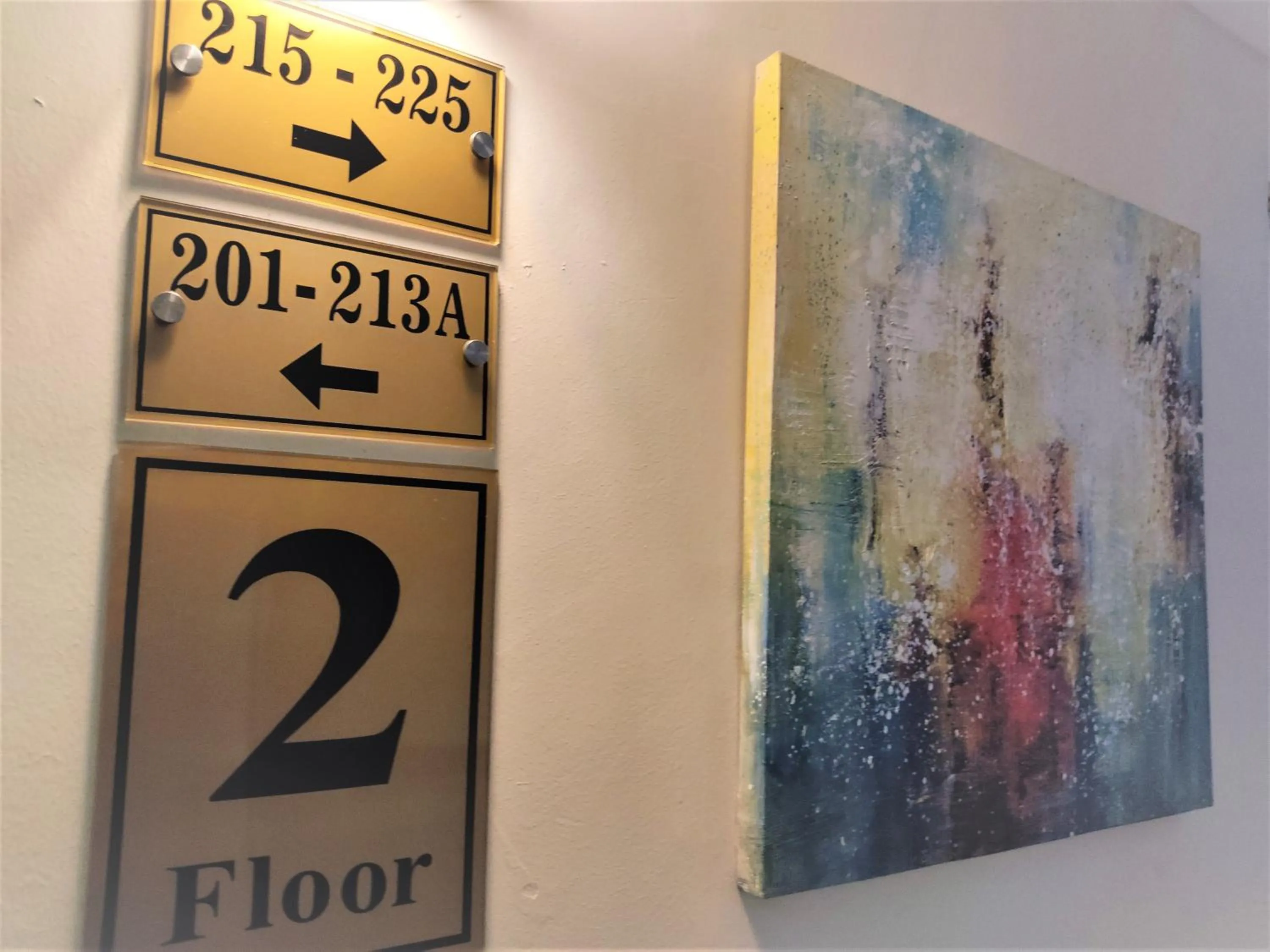 Property logo or sign in Apple Suites Hotel