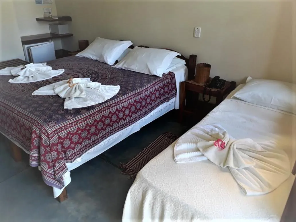 Bed in Pousada Ponta do Muta