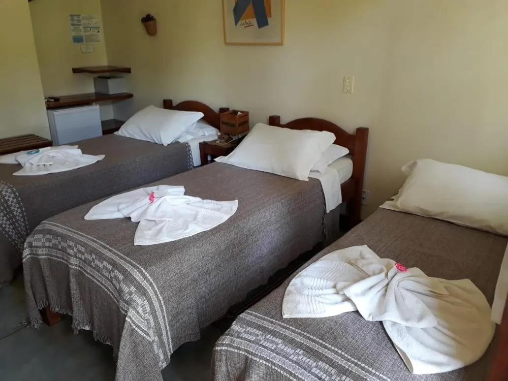 Bed in Pousada Ponta do Muta