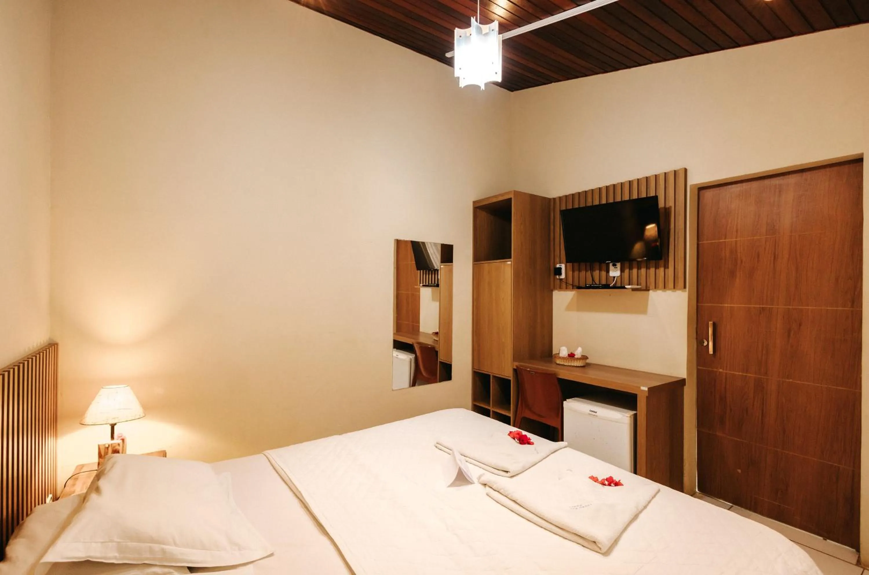 Property building, Bed in Pousada Lenda das Águas