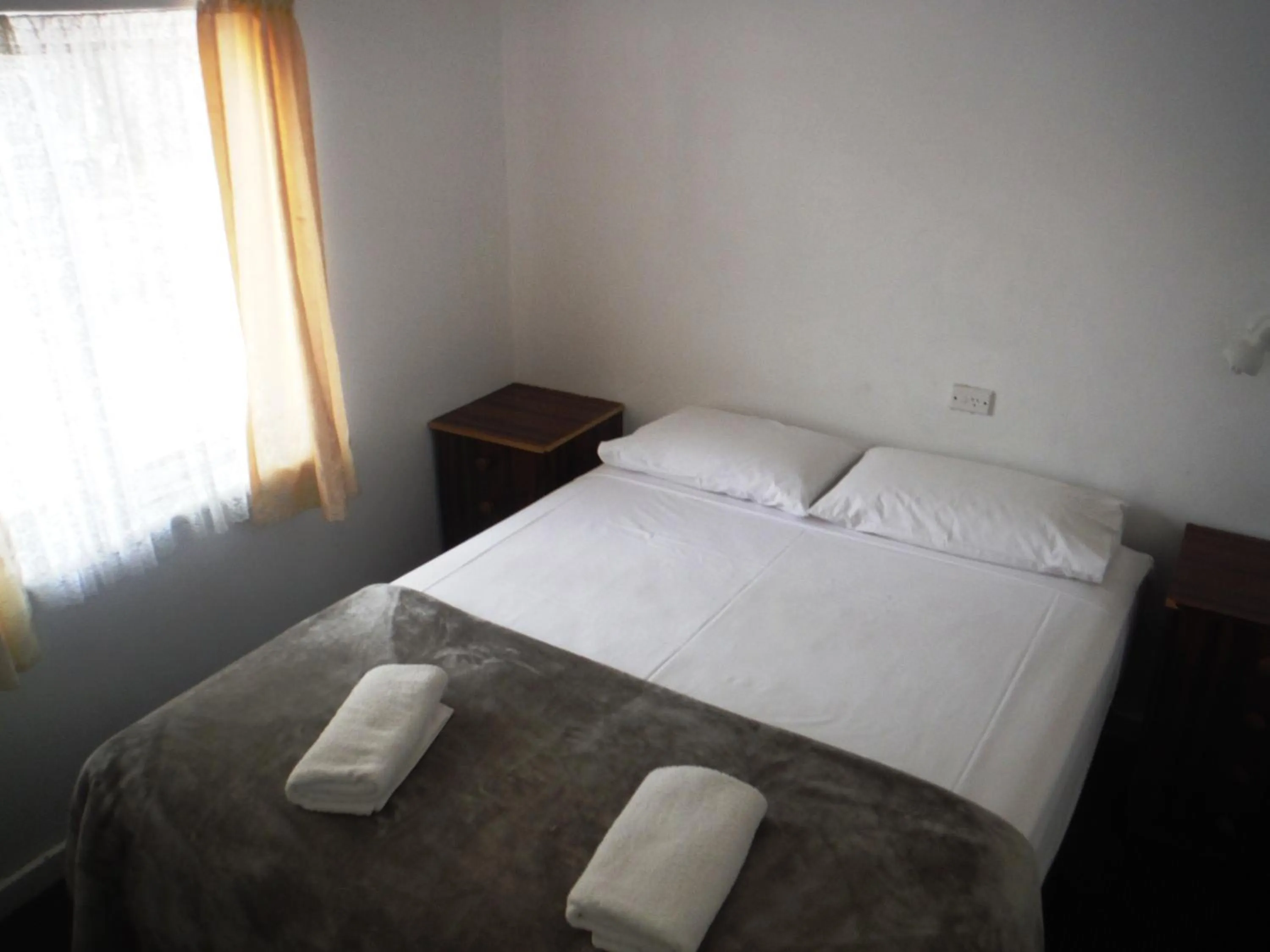 Bed in Restawile Motel