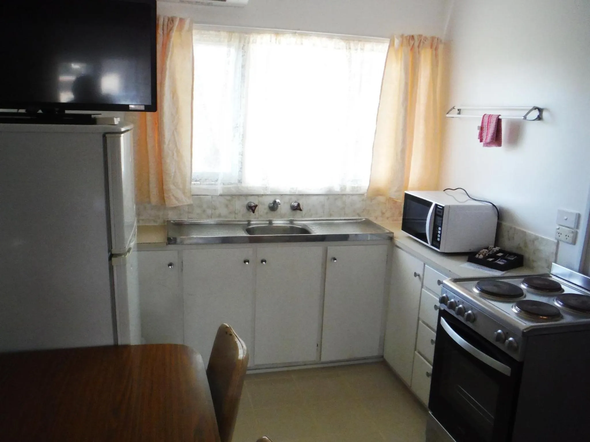 Kitchen or kitchenette in Restawile Motel