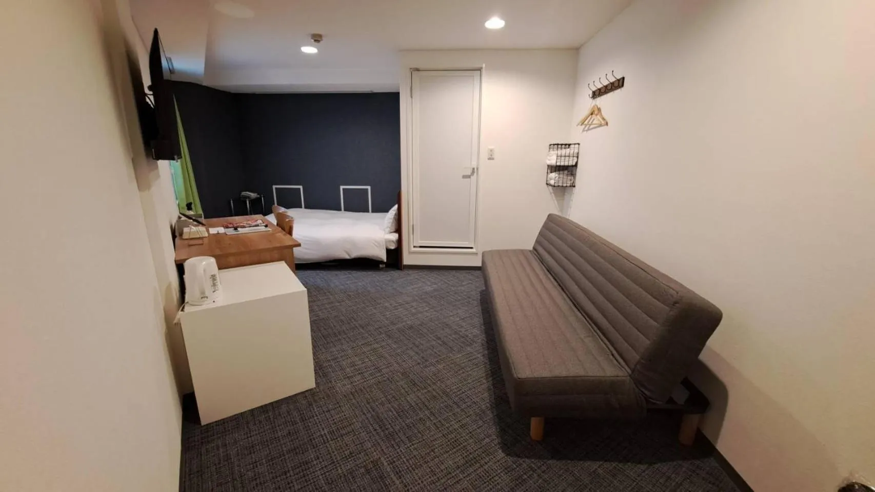 Photo of the whole room, Bed in Grampus Inn Osaka Namba