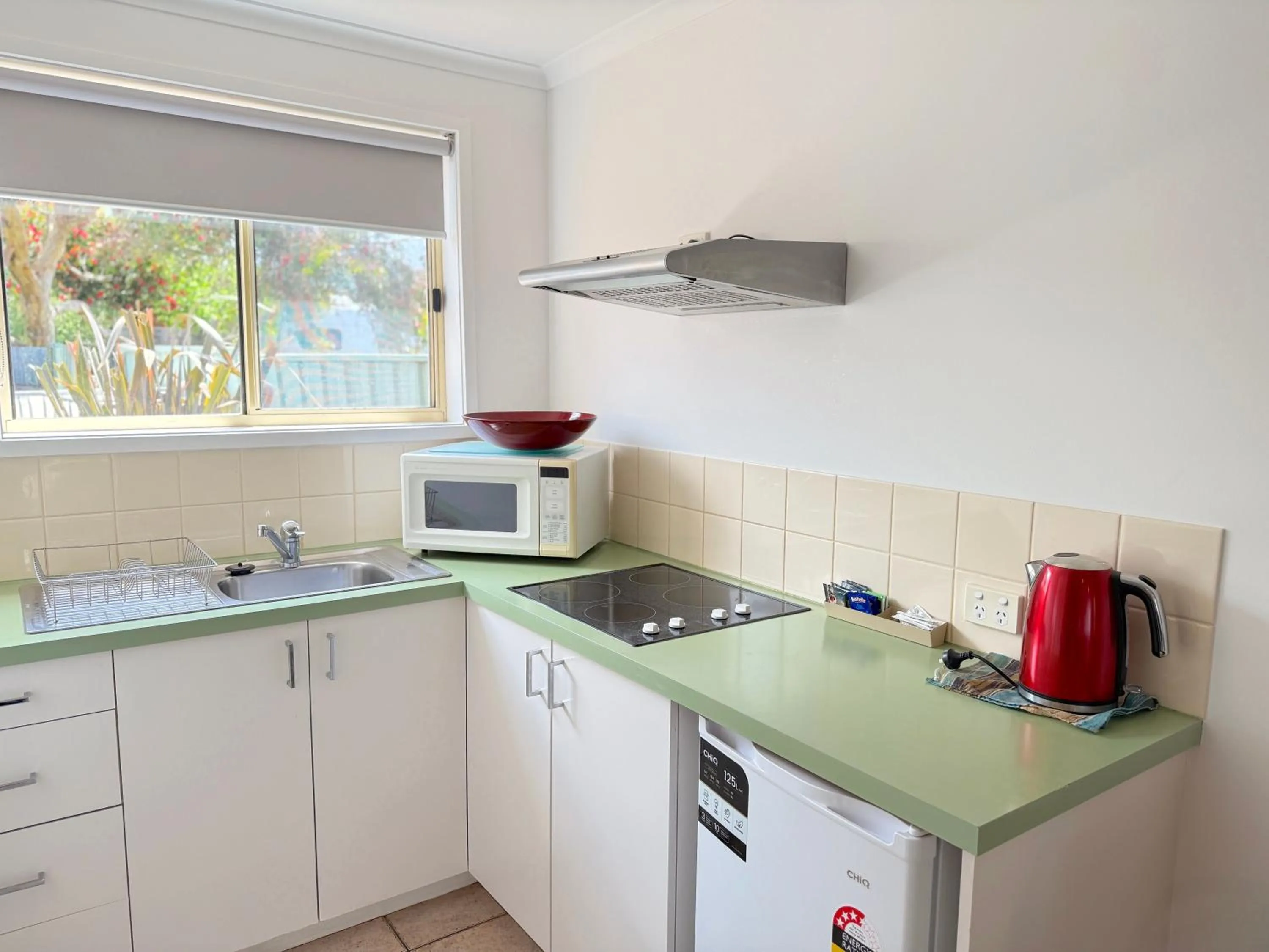 Property logo or sign in Beachcomber Motel & Apartments