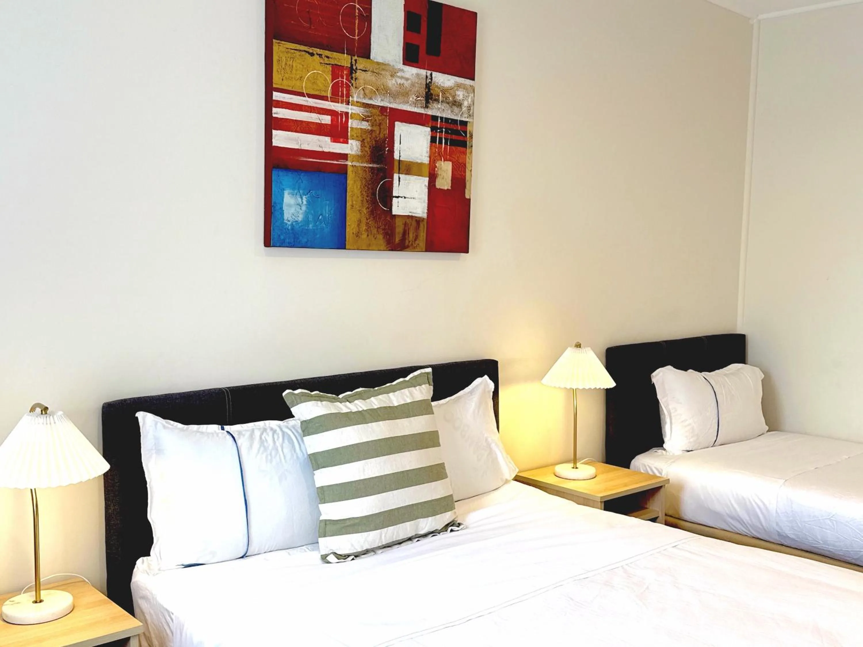 Bed in Beachcomber Motel & Apartments