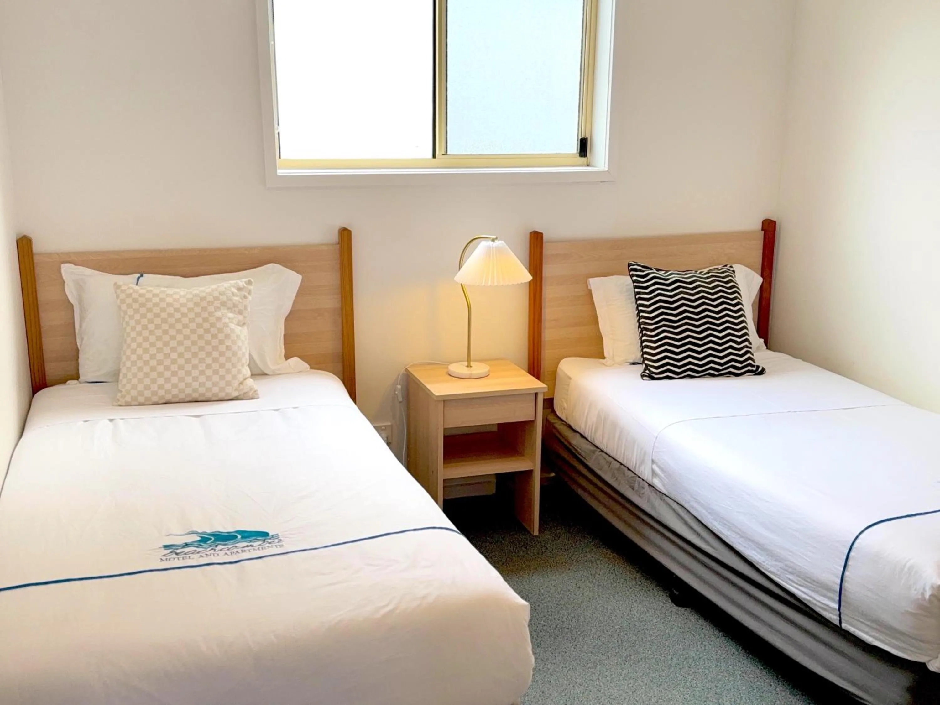 Family, Bed in Beachcomber Motel & Apartments