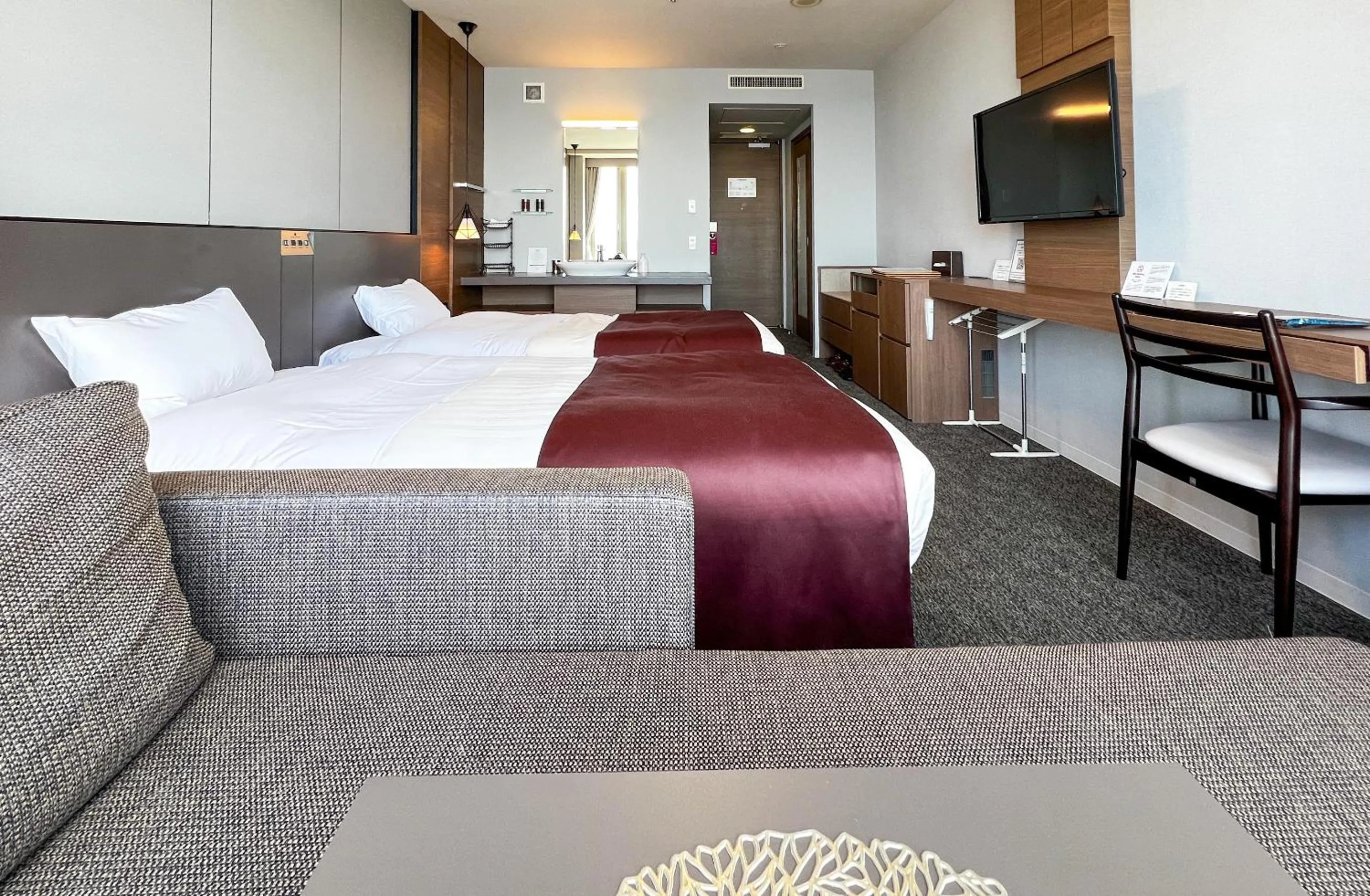 Photo of the whole room, Bed in Lake Saroma Tsuruga Resort