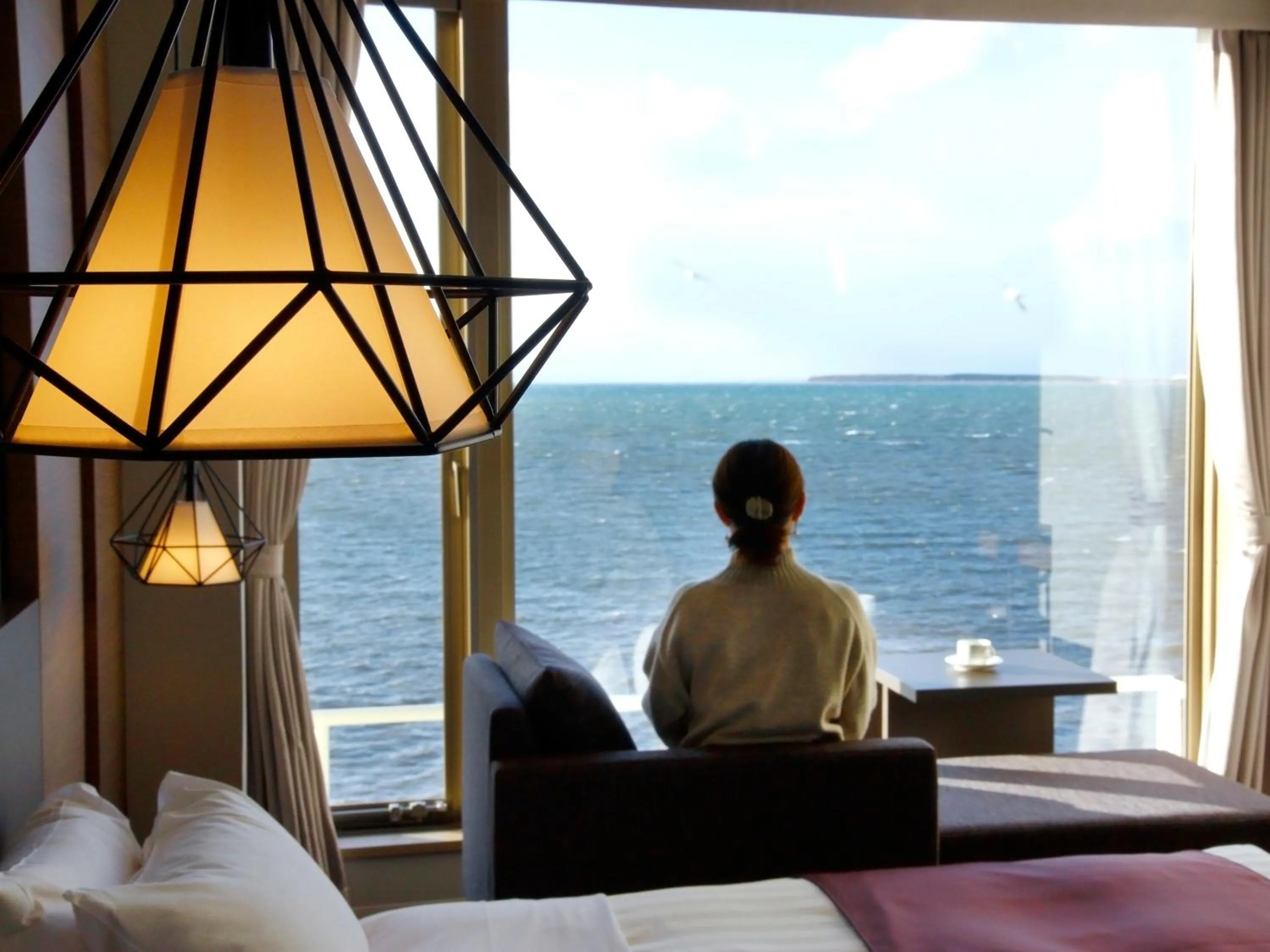 Photo of the whole room, Bed in Lake Saroma Tsuruga Resort