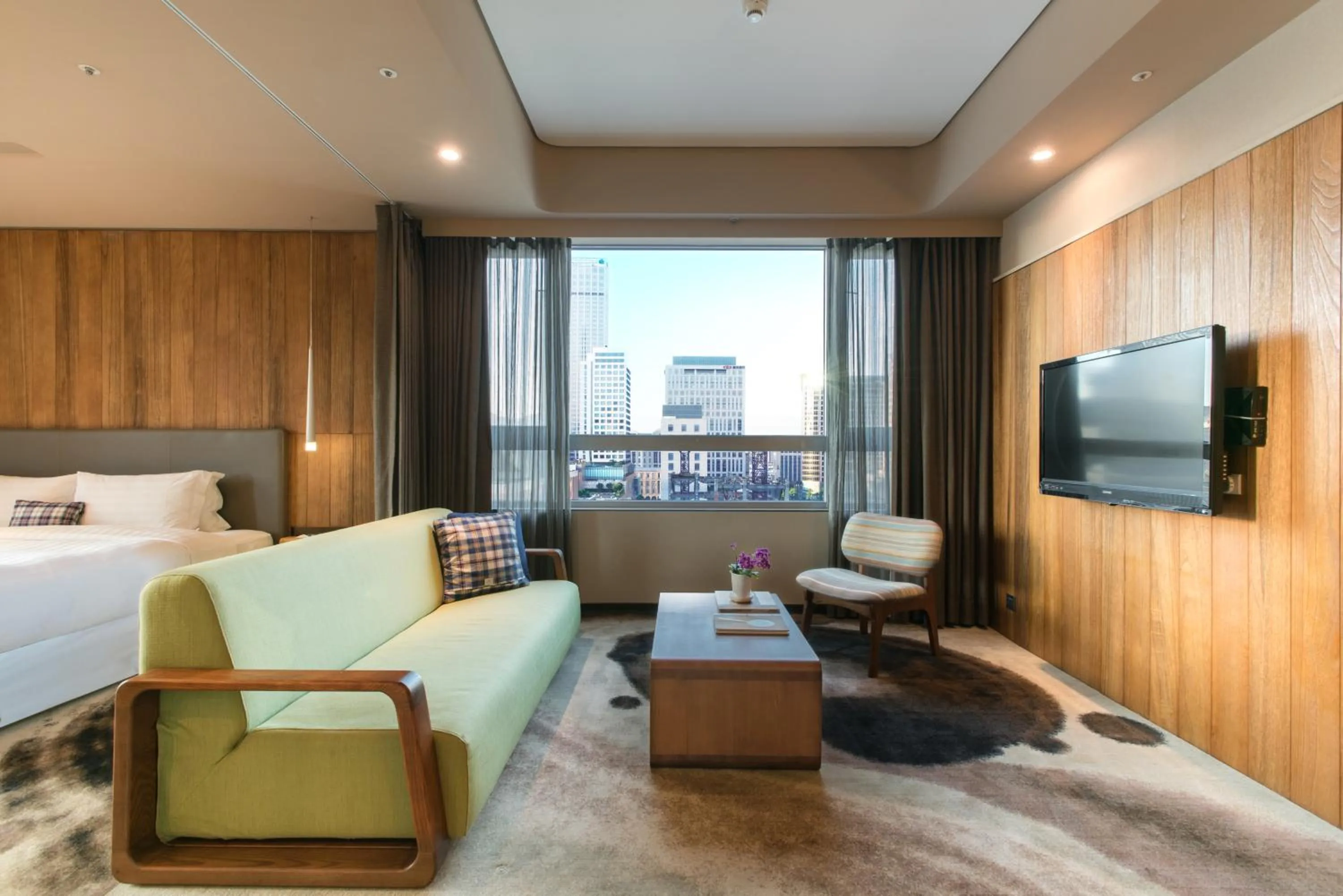 Living room, Bed in Home Hotel