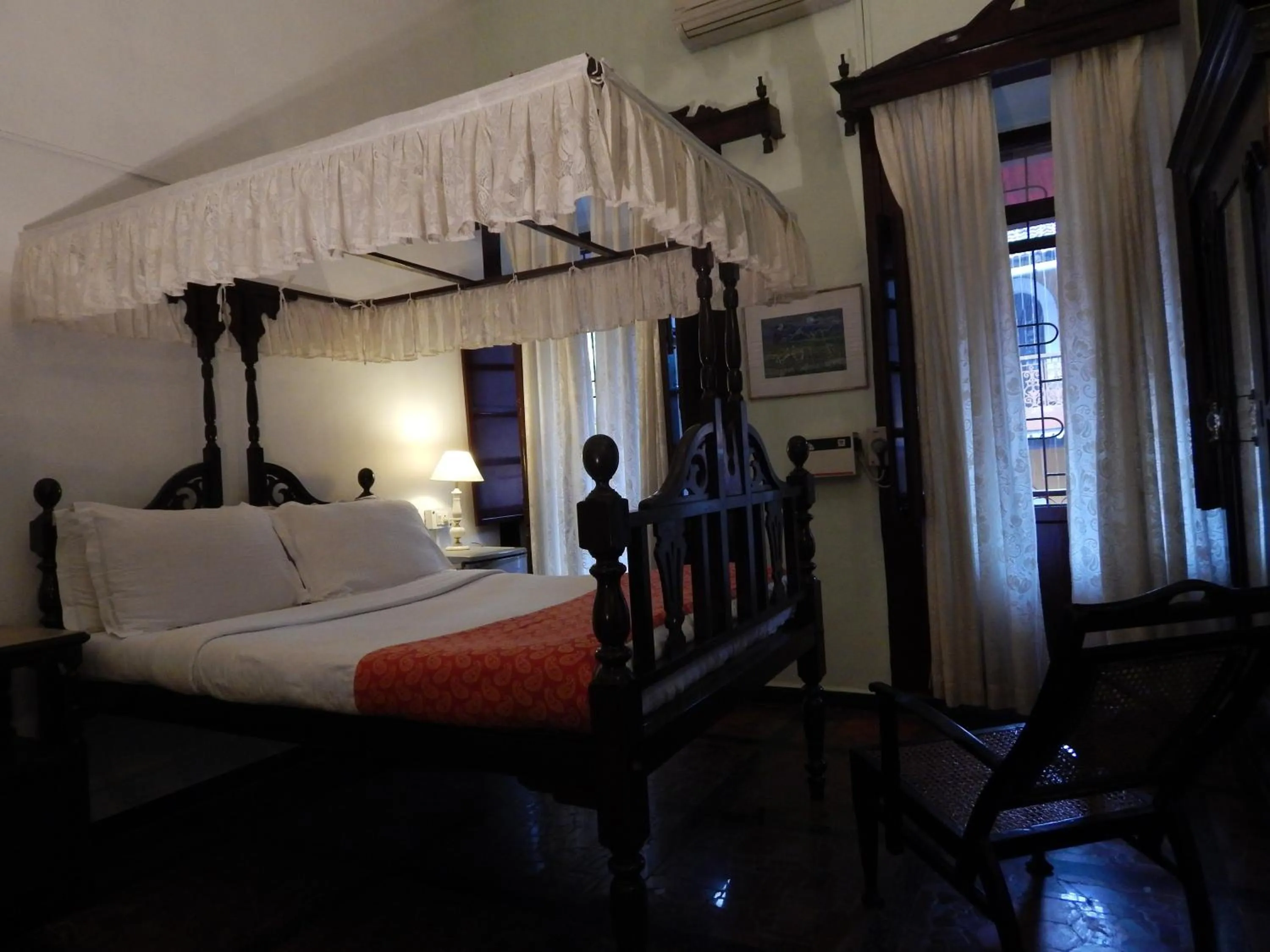 Photo of the whole room, Bed in WelcomHeritage Panjim Inn