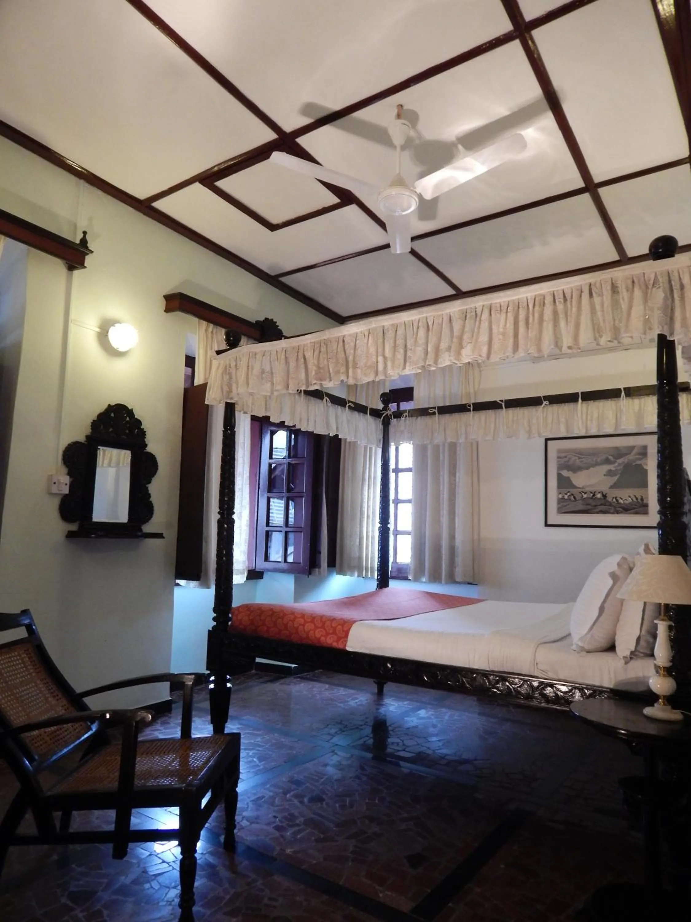 Photo of the whole room, Bed in WelcomHeritage Panjim Inn