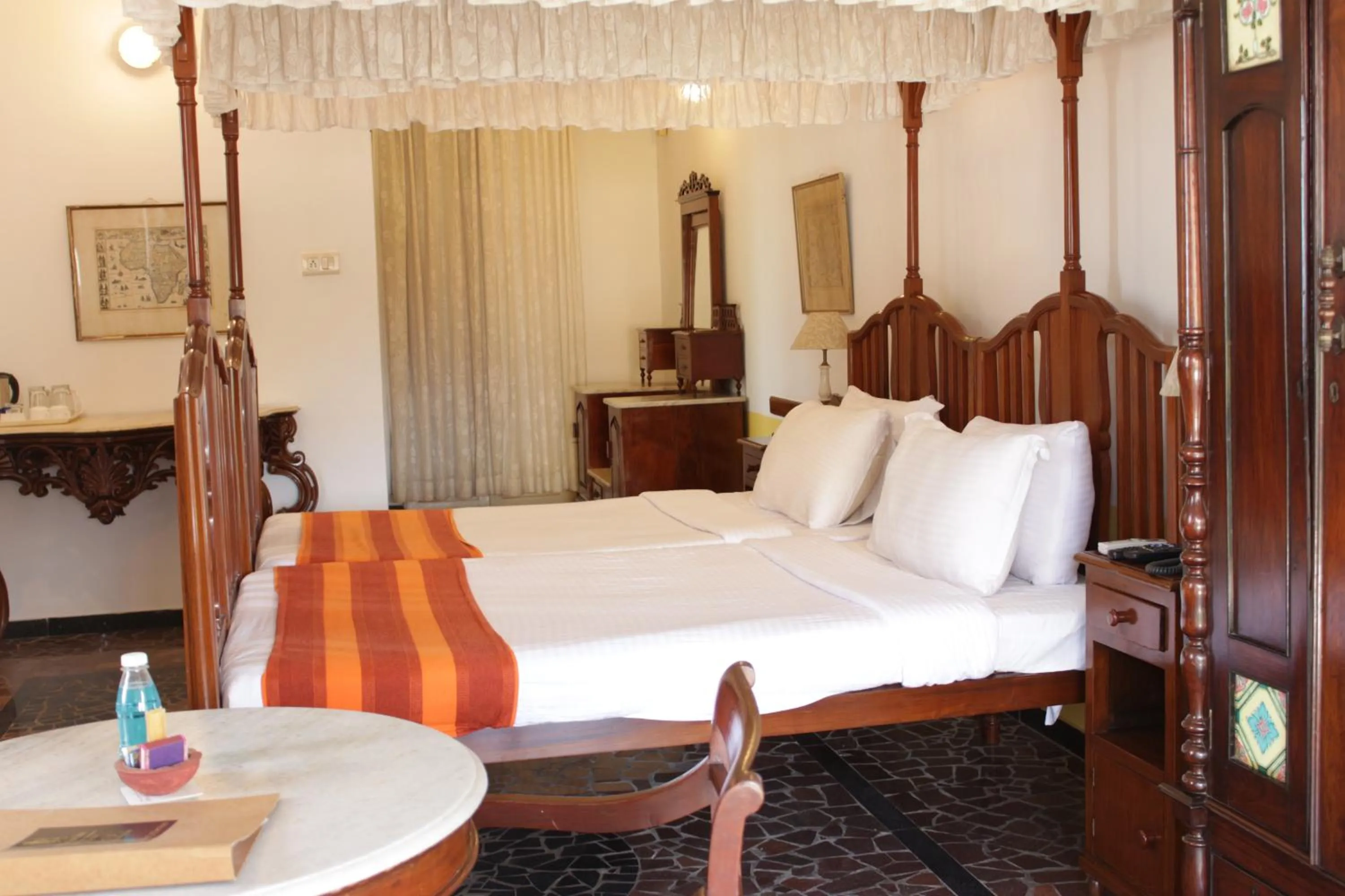 Bed in WelcomHeritage Panjim Inn