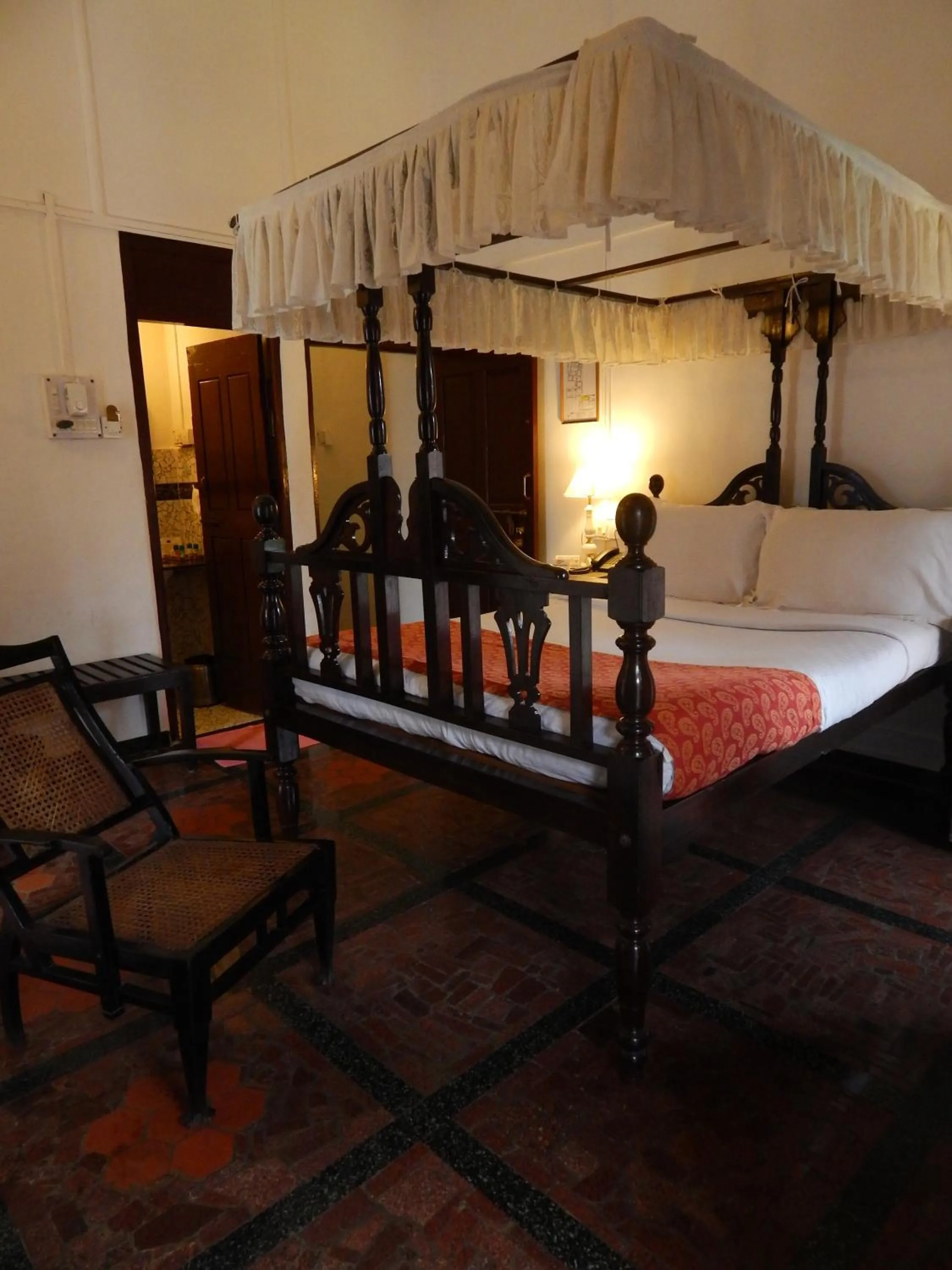 Photo of the whole room, Bed in WelcomHeritage Panjim Inn