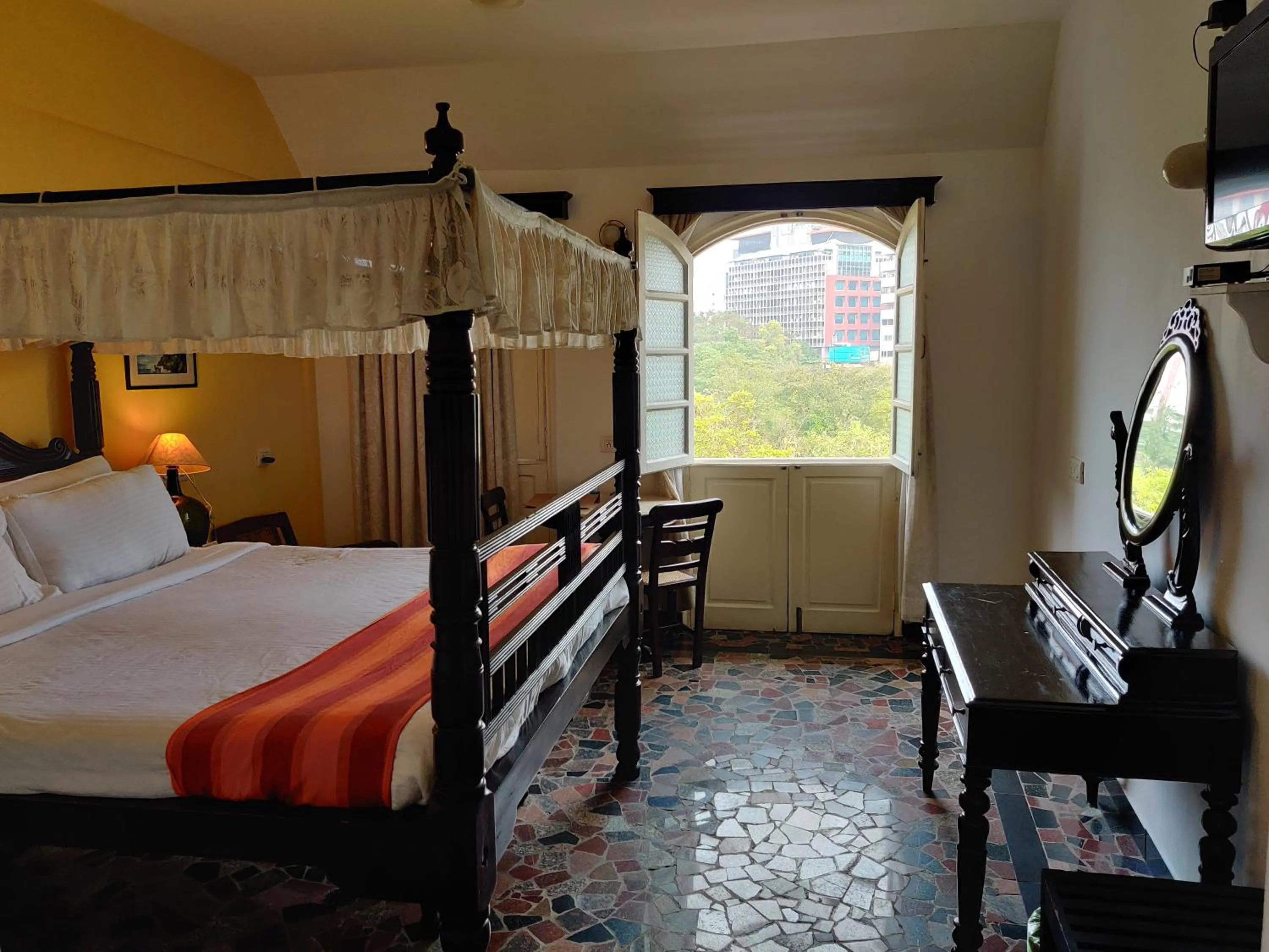 Bed in WelcomHeritage Panjim Inn