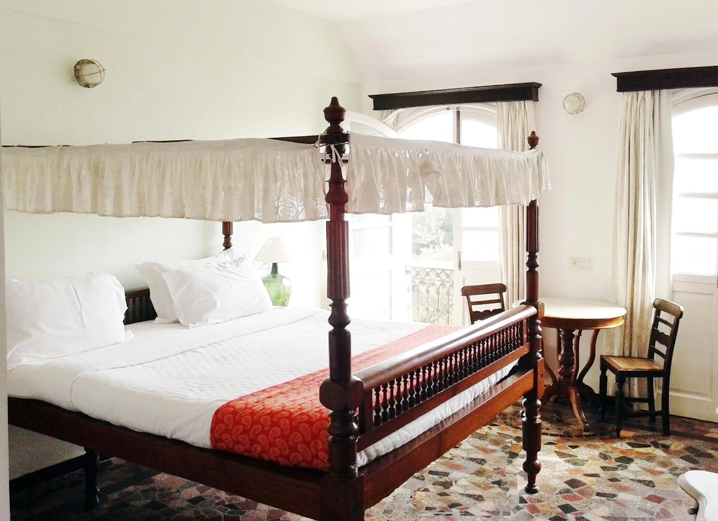 Bed in WelcomHeritage Panjim Inn