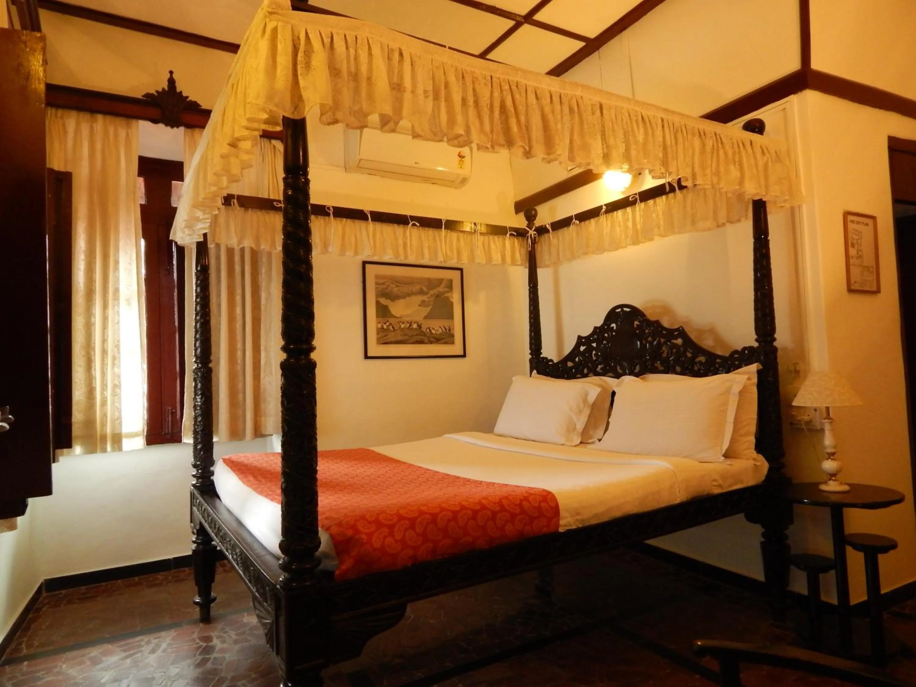 Photo of the whole room, Bed in WelcomHeritage Panjim Inn