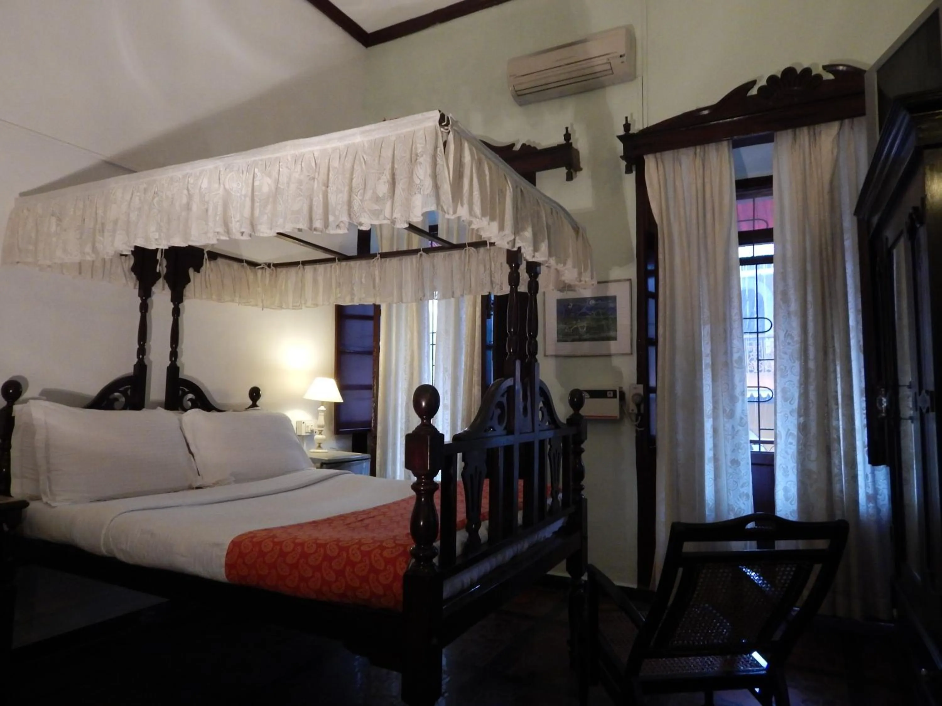 Photo of the whole room, Bed in WelcomHeritage Panjim Inn