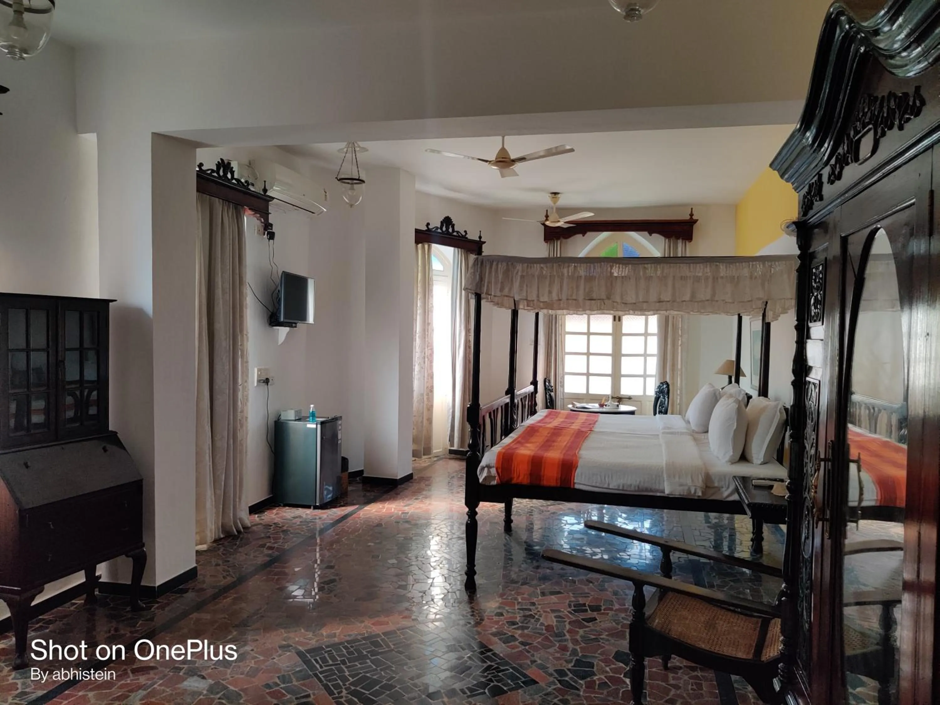 Bed in WelcomHeritage Panjim Inn