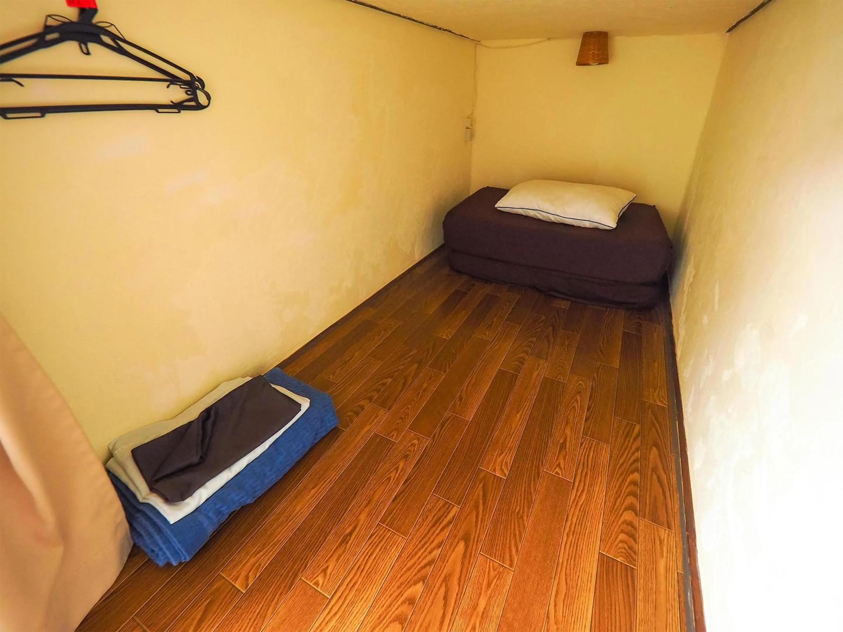 Bed in Guesthouse Churayado Ishigakijima