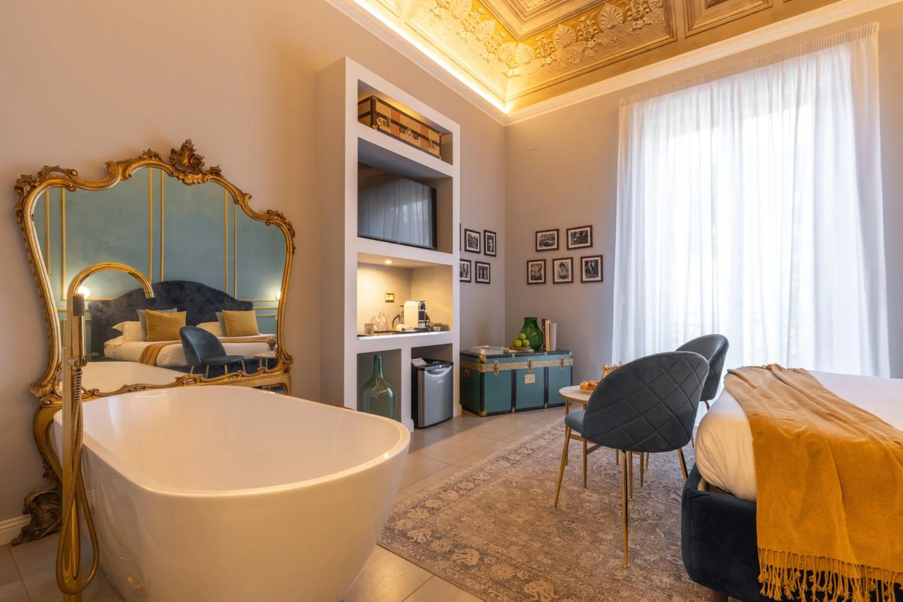 Bed in Family Affair Luxury Rooms&Suites