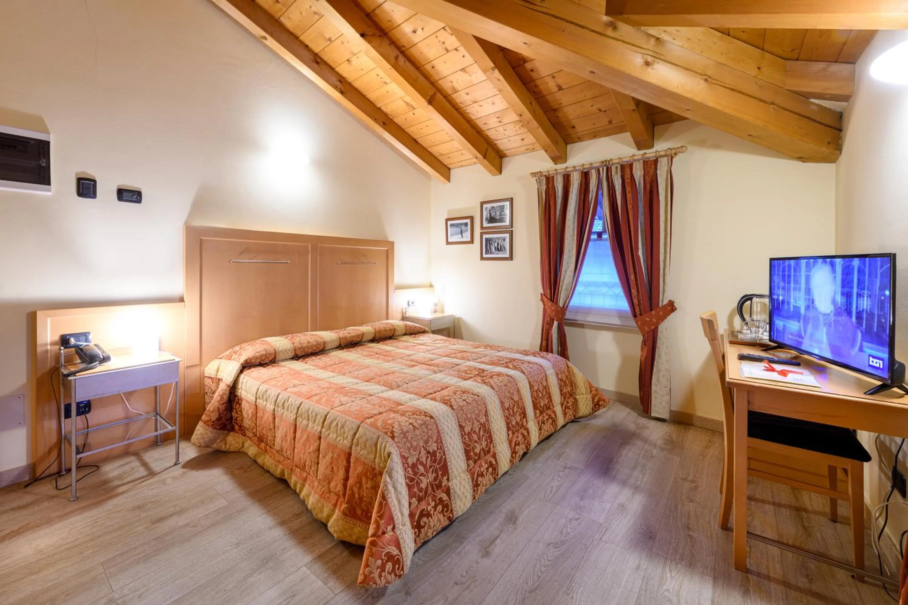 Photo of the whole room, Bed in Hotel Garni Le Corti