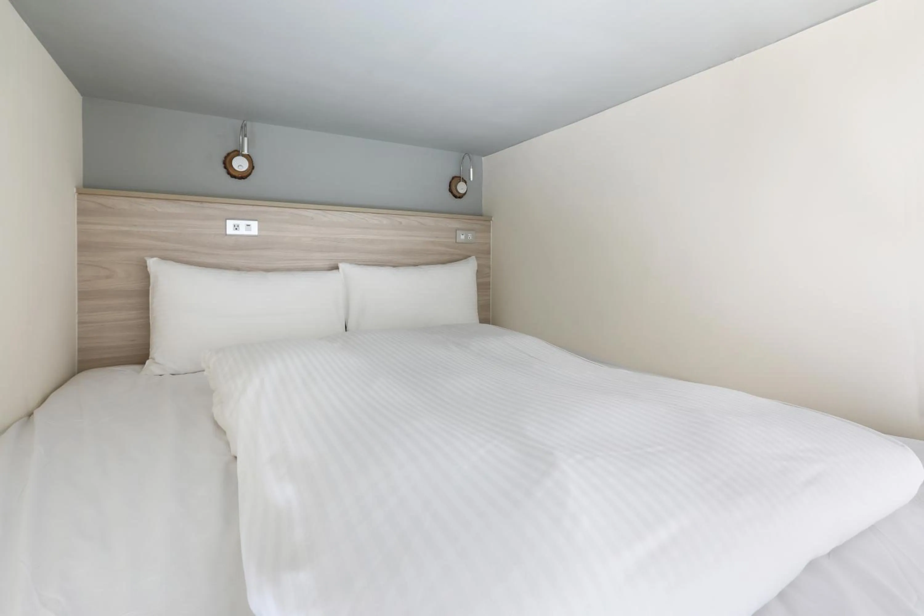 Bed in MINI HOTELS (Taichung Station Branch)