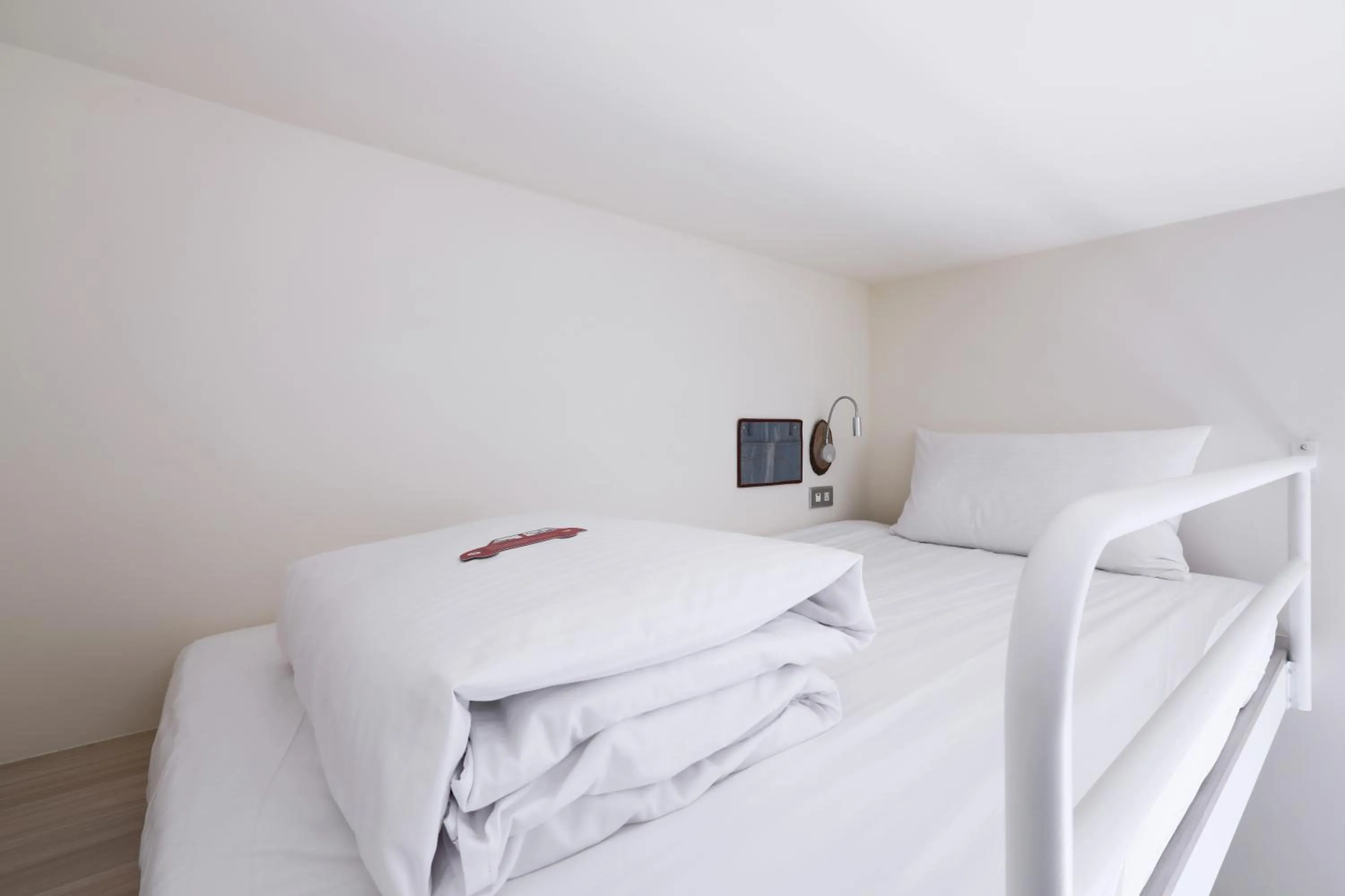 Bed in MINI HOTELS (Taichung Station Branch)