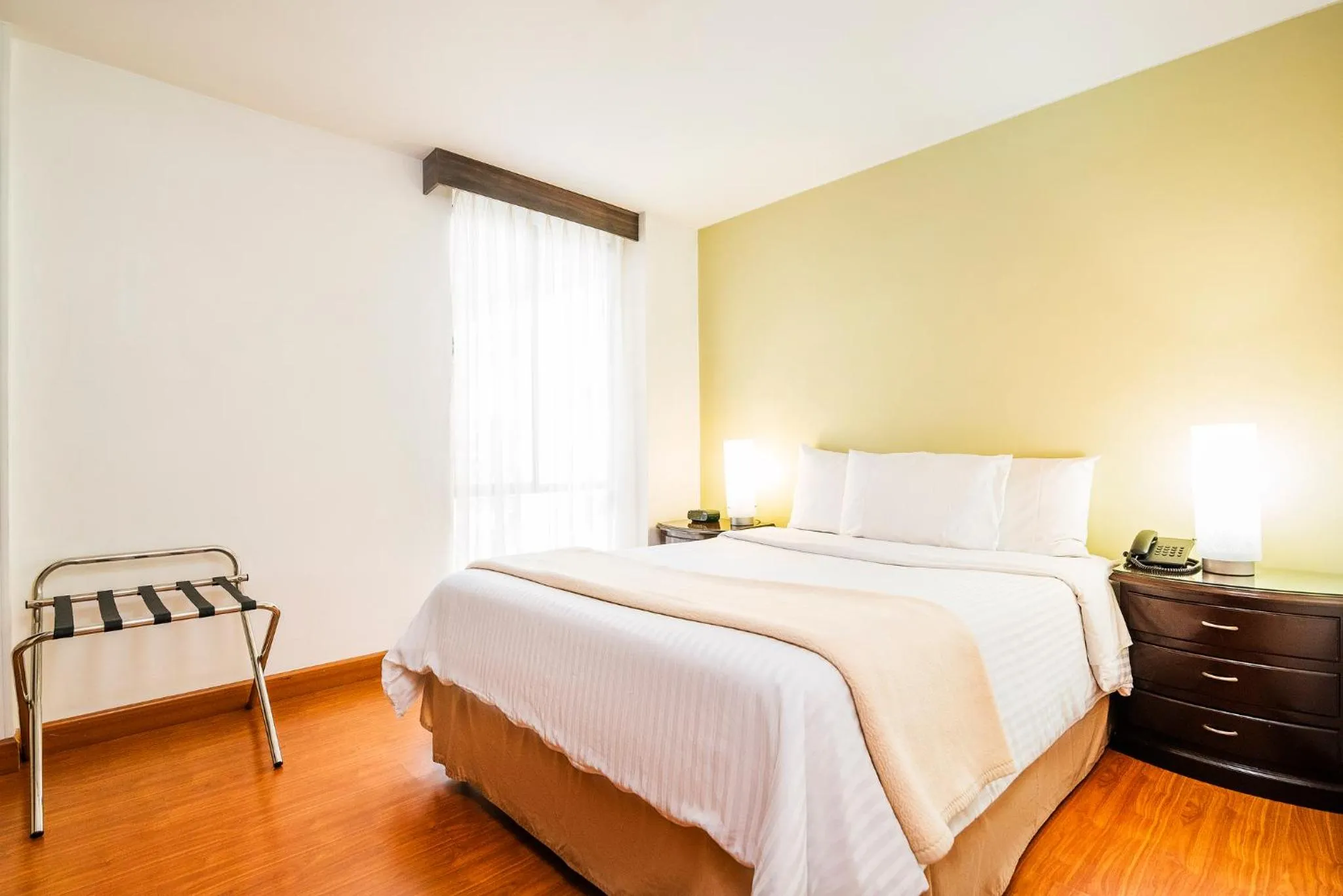 Bedroom, Bed in Lloyds Apartasuites Parque 93