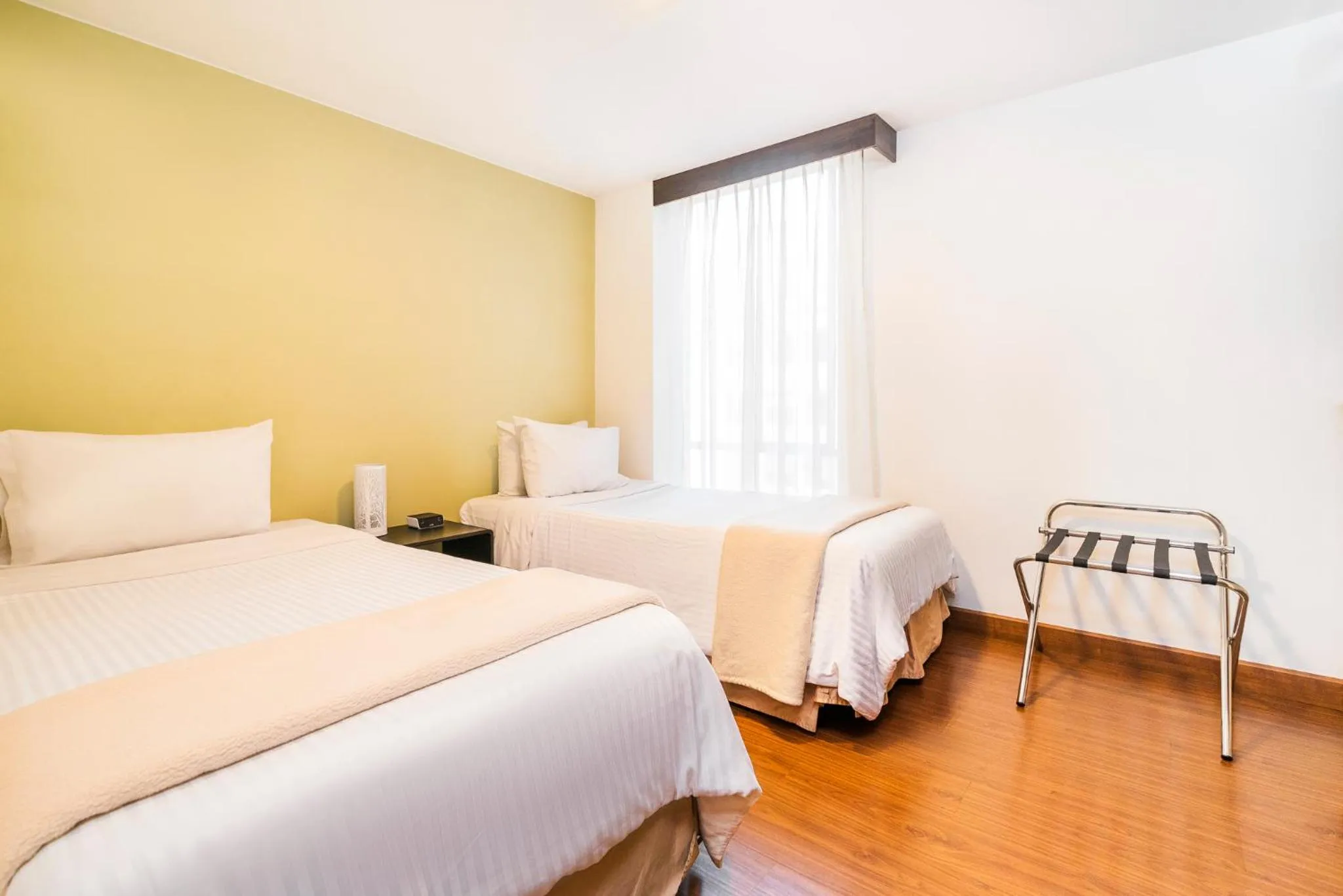 Bedroom, Bed in Lloyds Apartasuites Parque 93