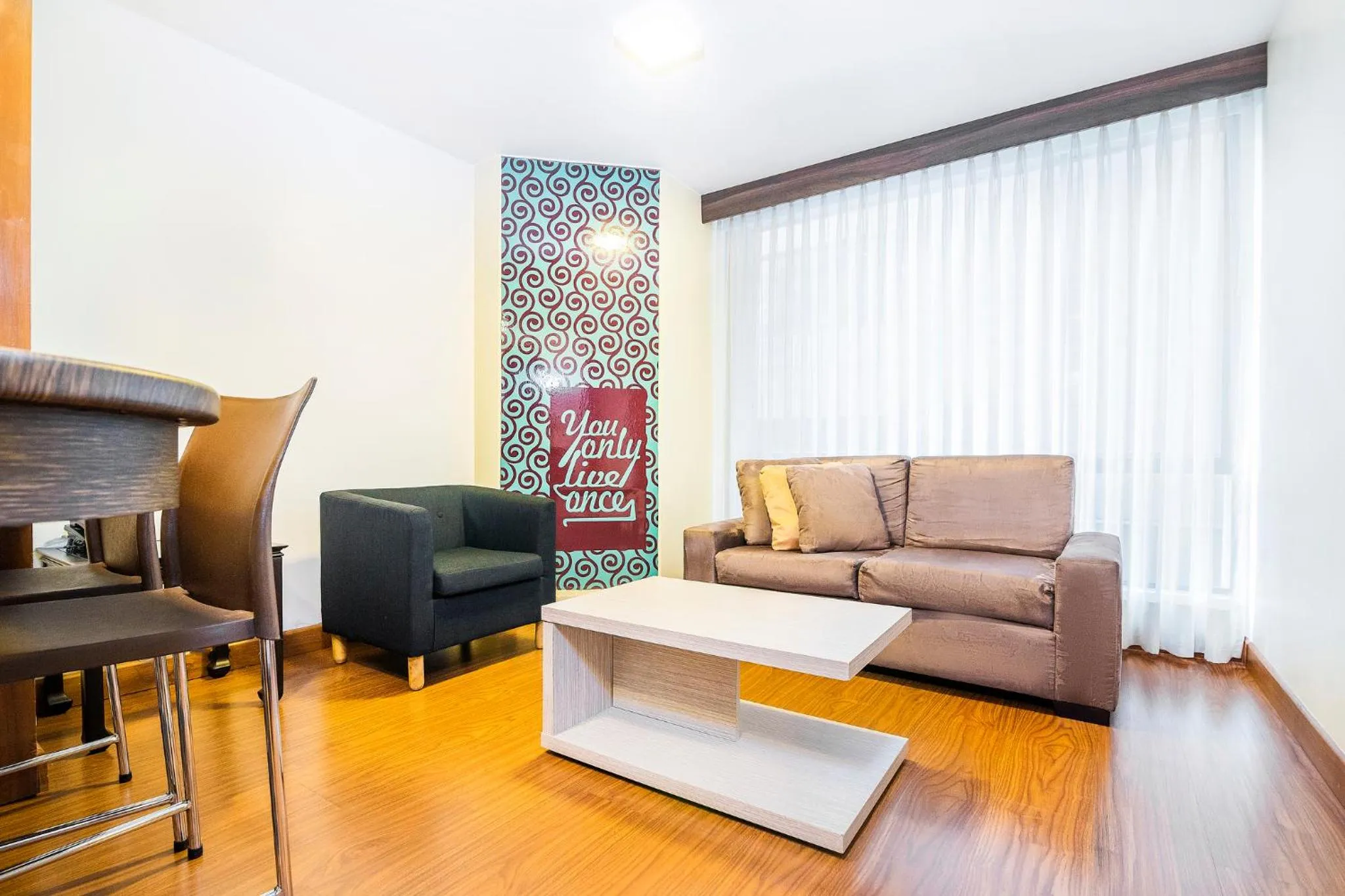 Living room in Lloyds Apartasuites Parque 93