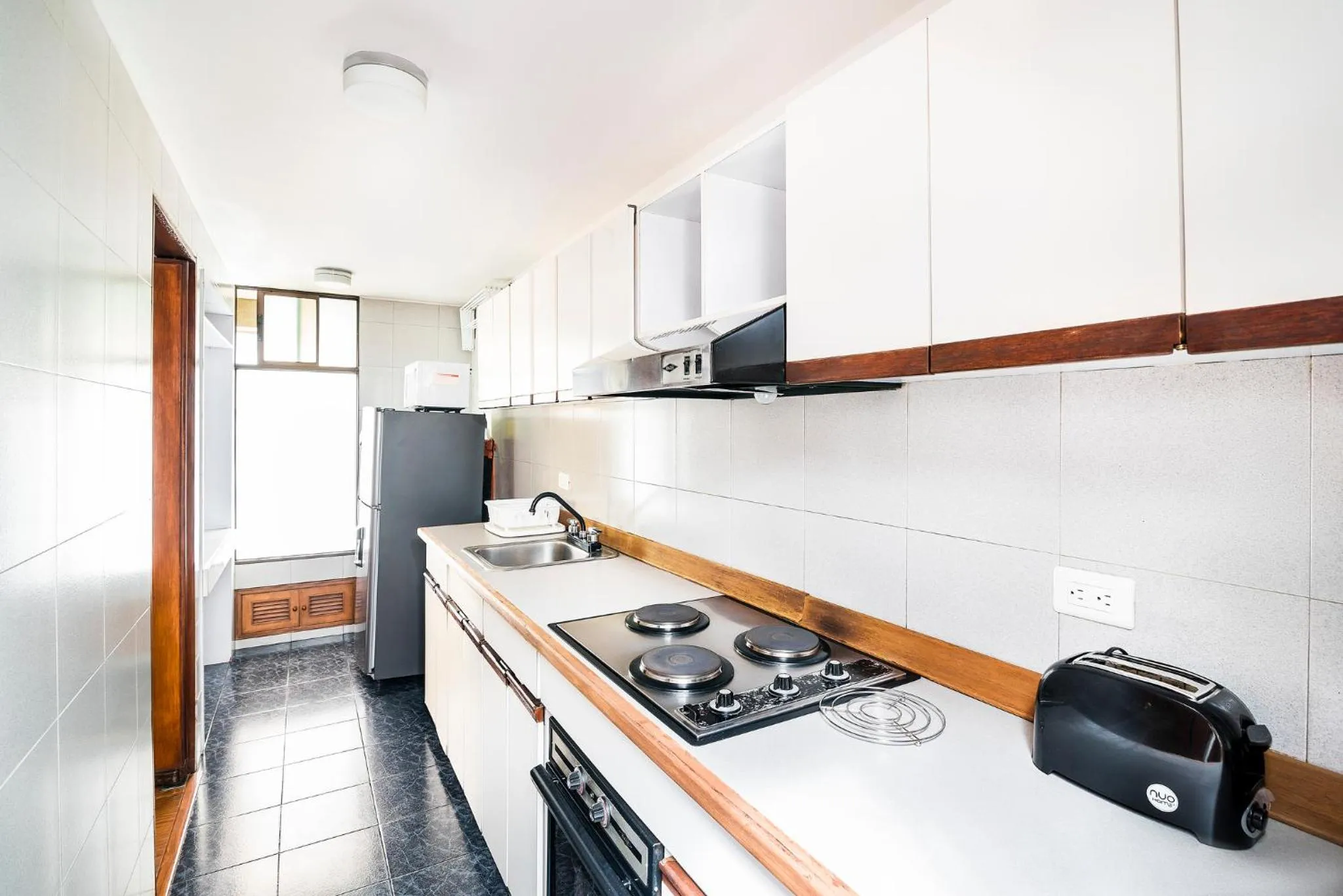 Kitchen or kitchenette in Lloyds Apartasuites Parque 93