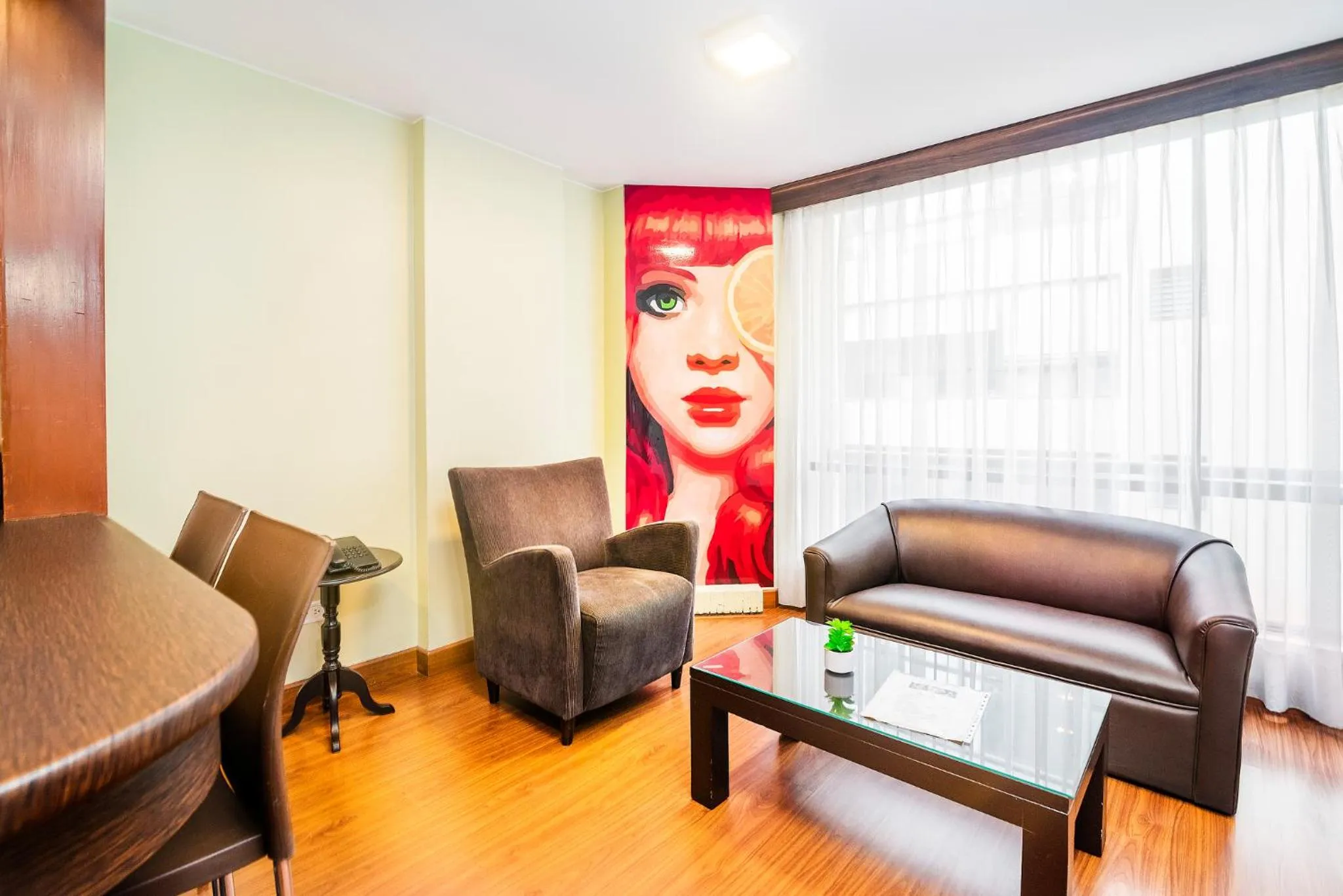 Living room in Lloyds Apartasuites Parque 93