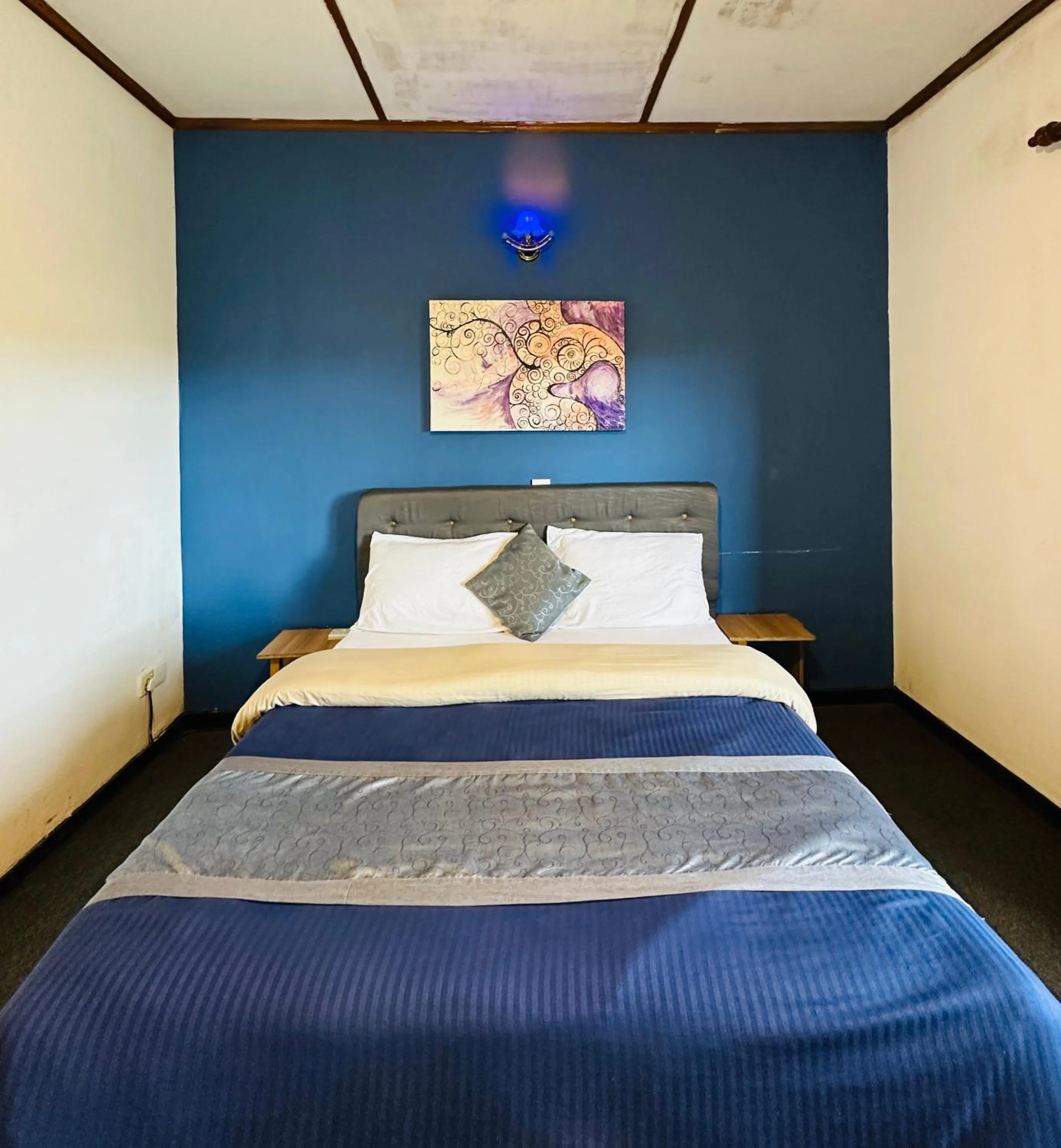 Bed in New Royal Mount Hotel