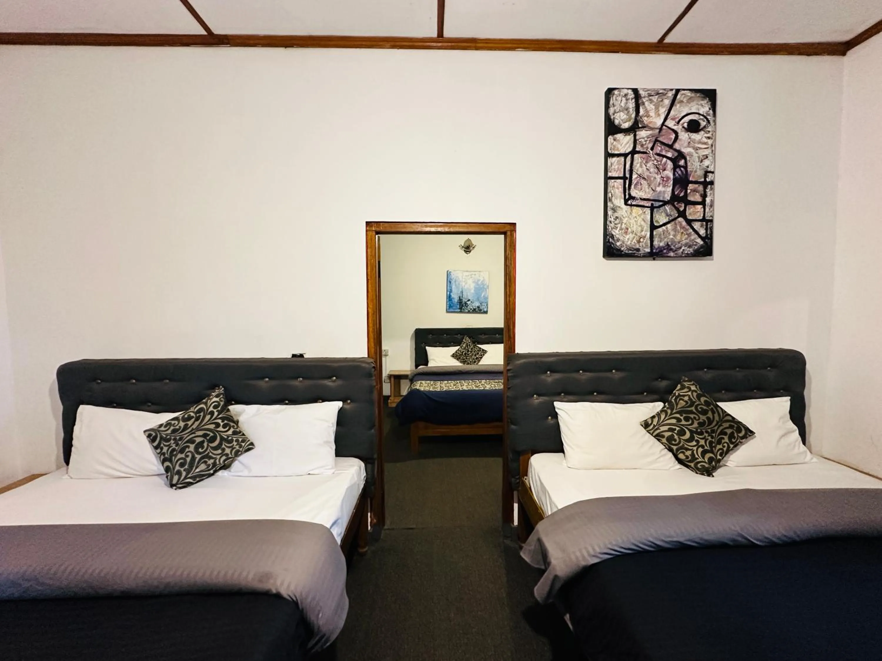 Bed in New Royal Mount Hotel