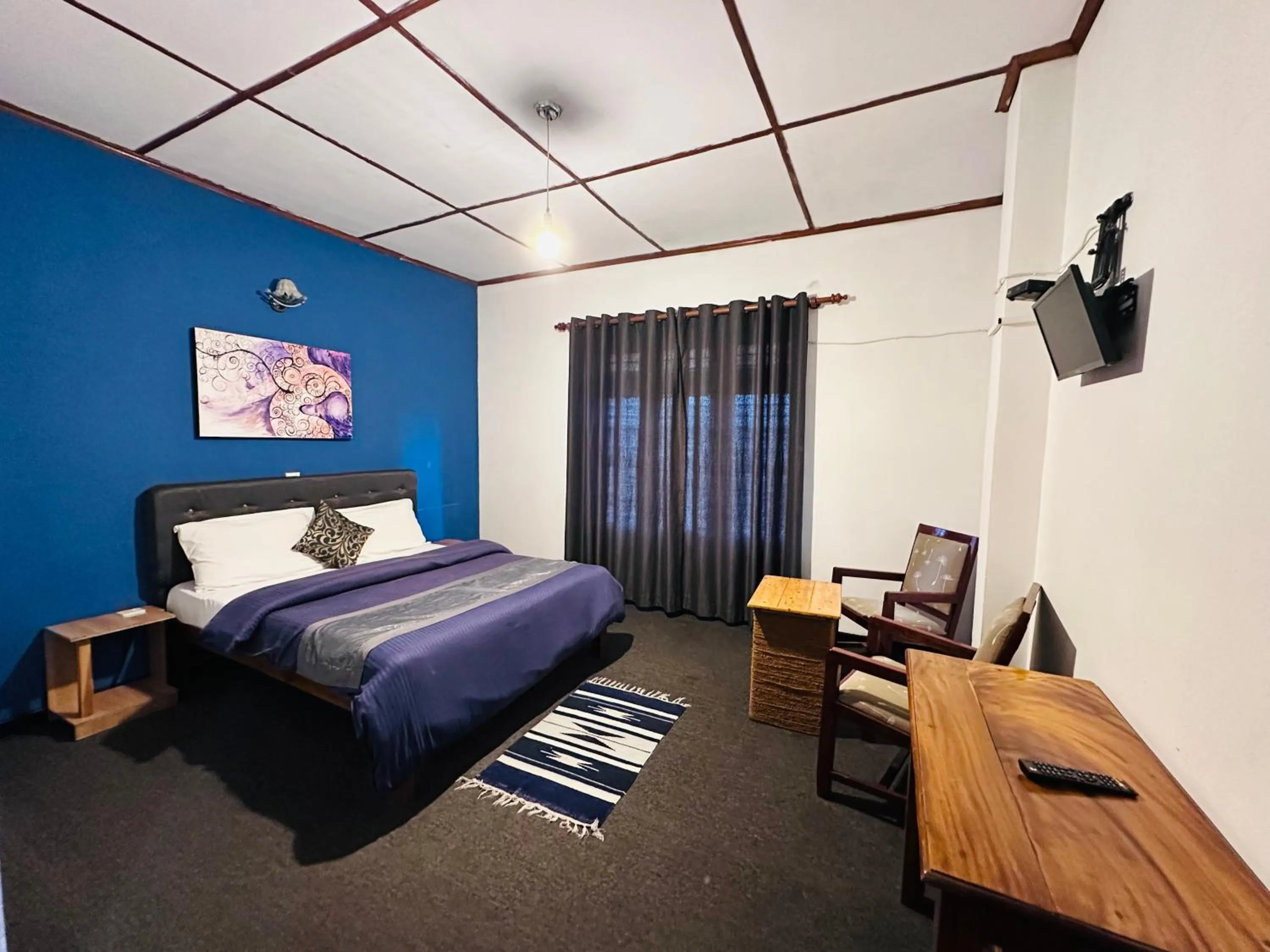 Bed in New Royal Mount Hotel