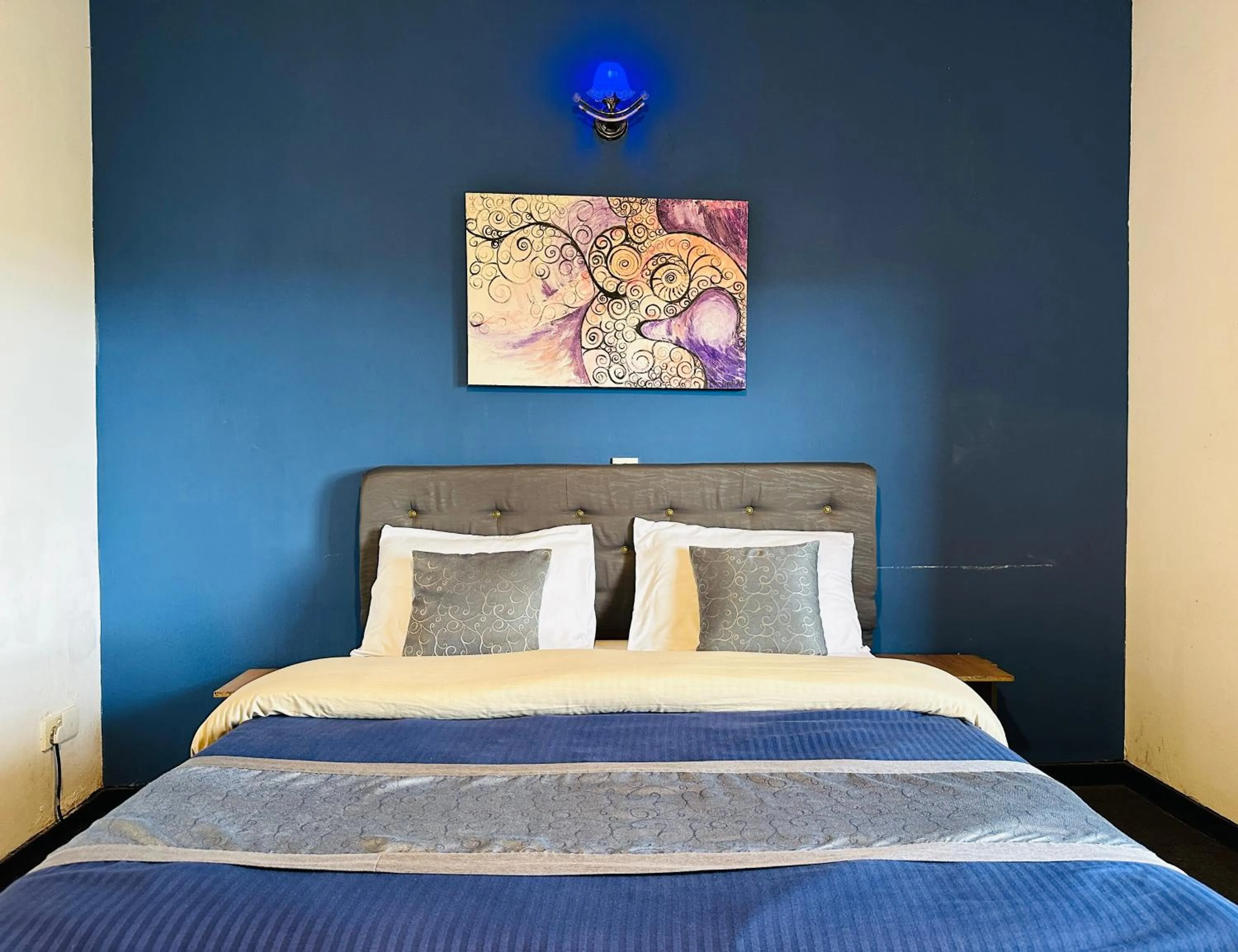 Bed in New Royal Mount Hotel