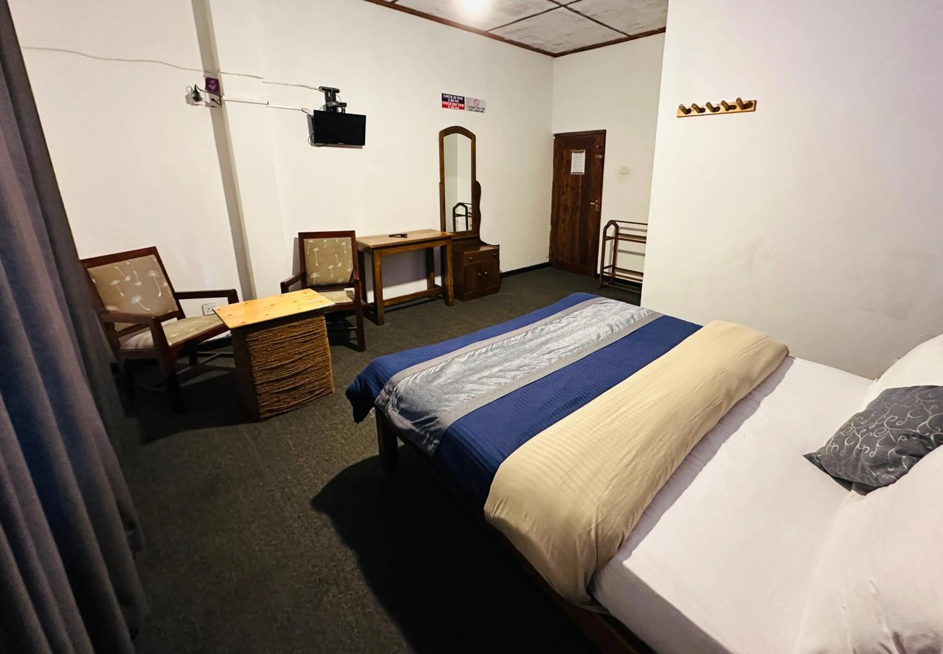 Bed in New Royal Mount Hotel