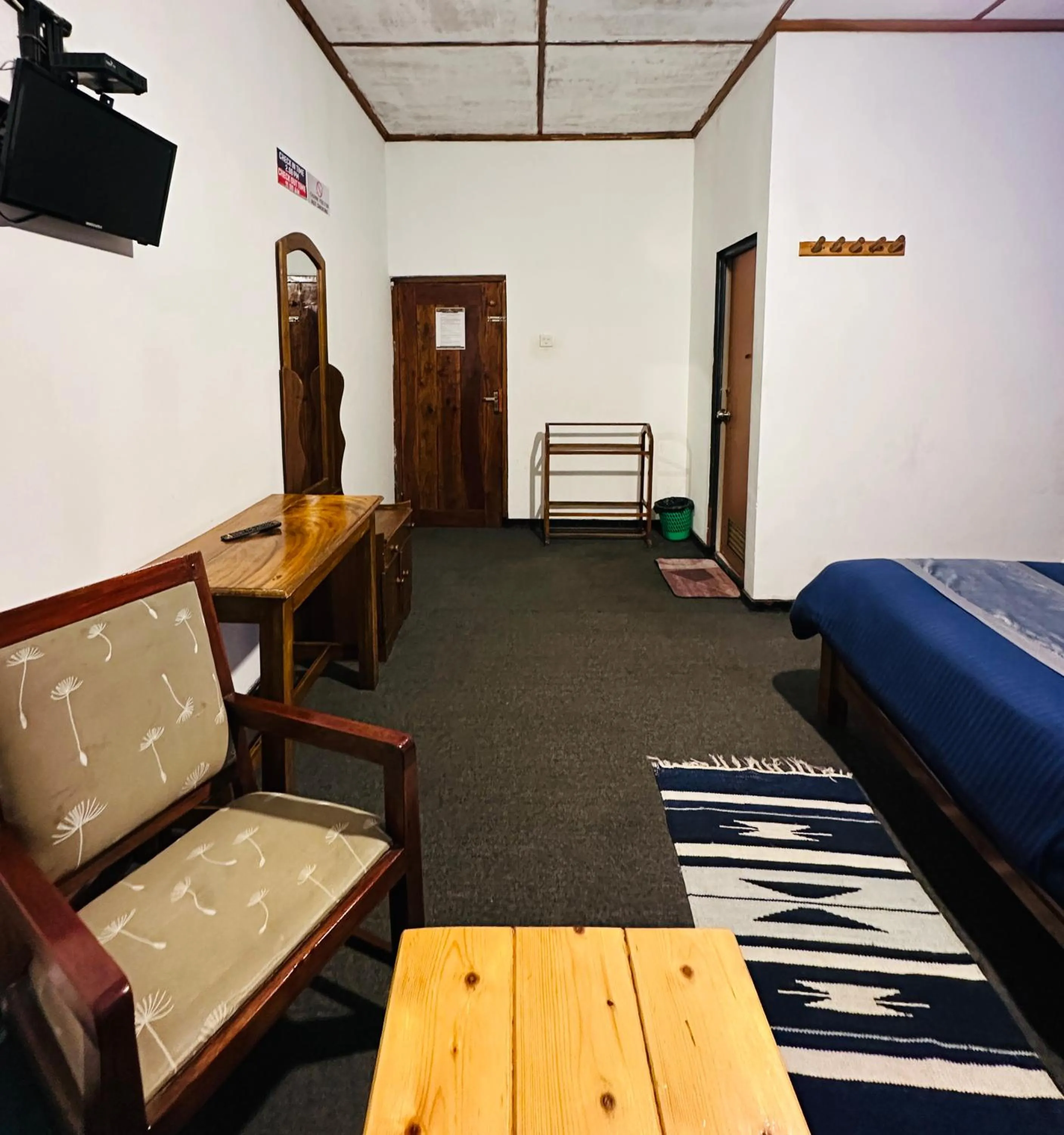 Bed in New Royal Mount Hotel