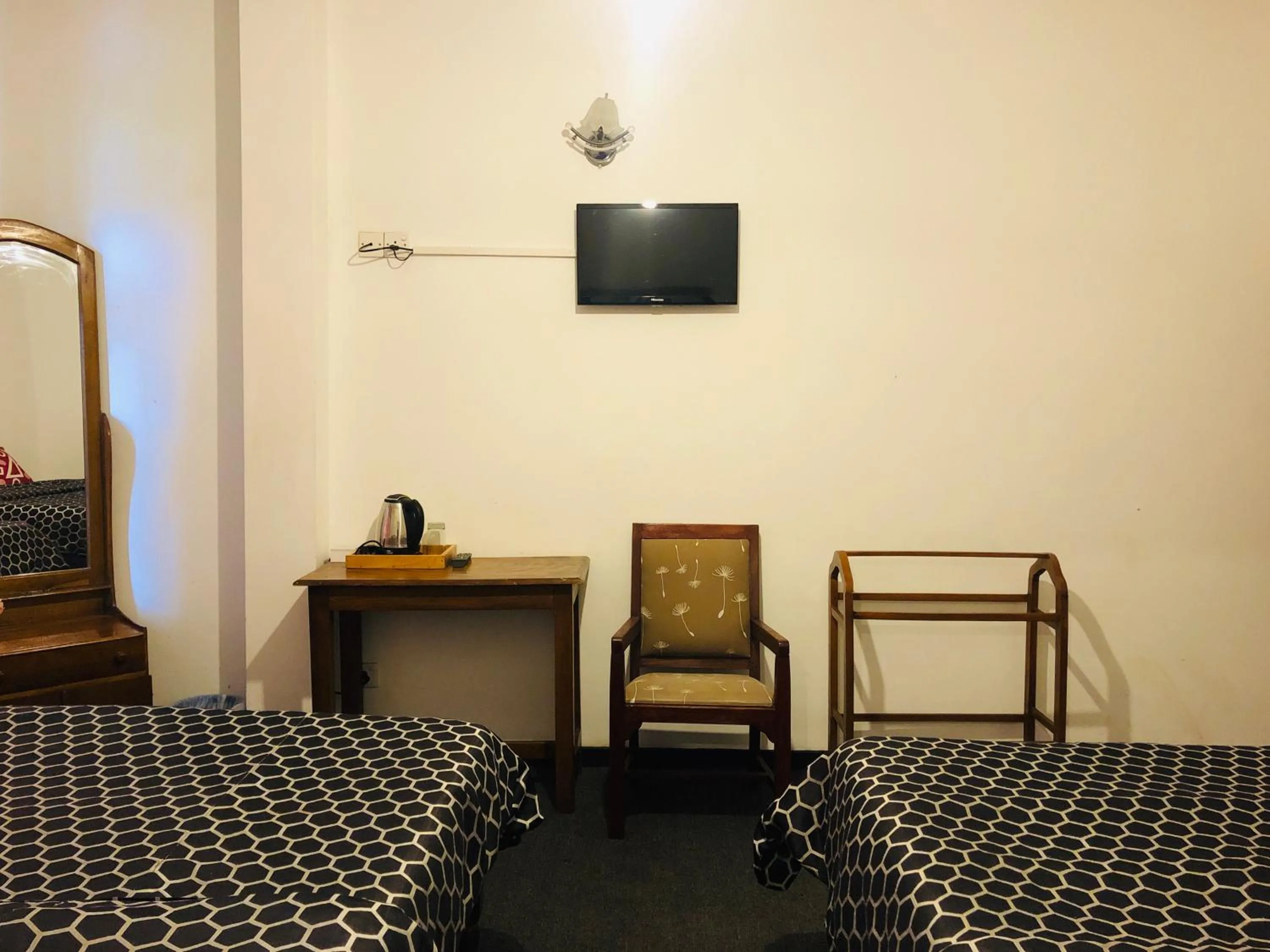 Bed in New Royal Mount Hotel